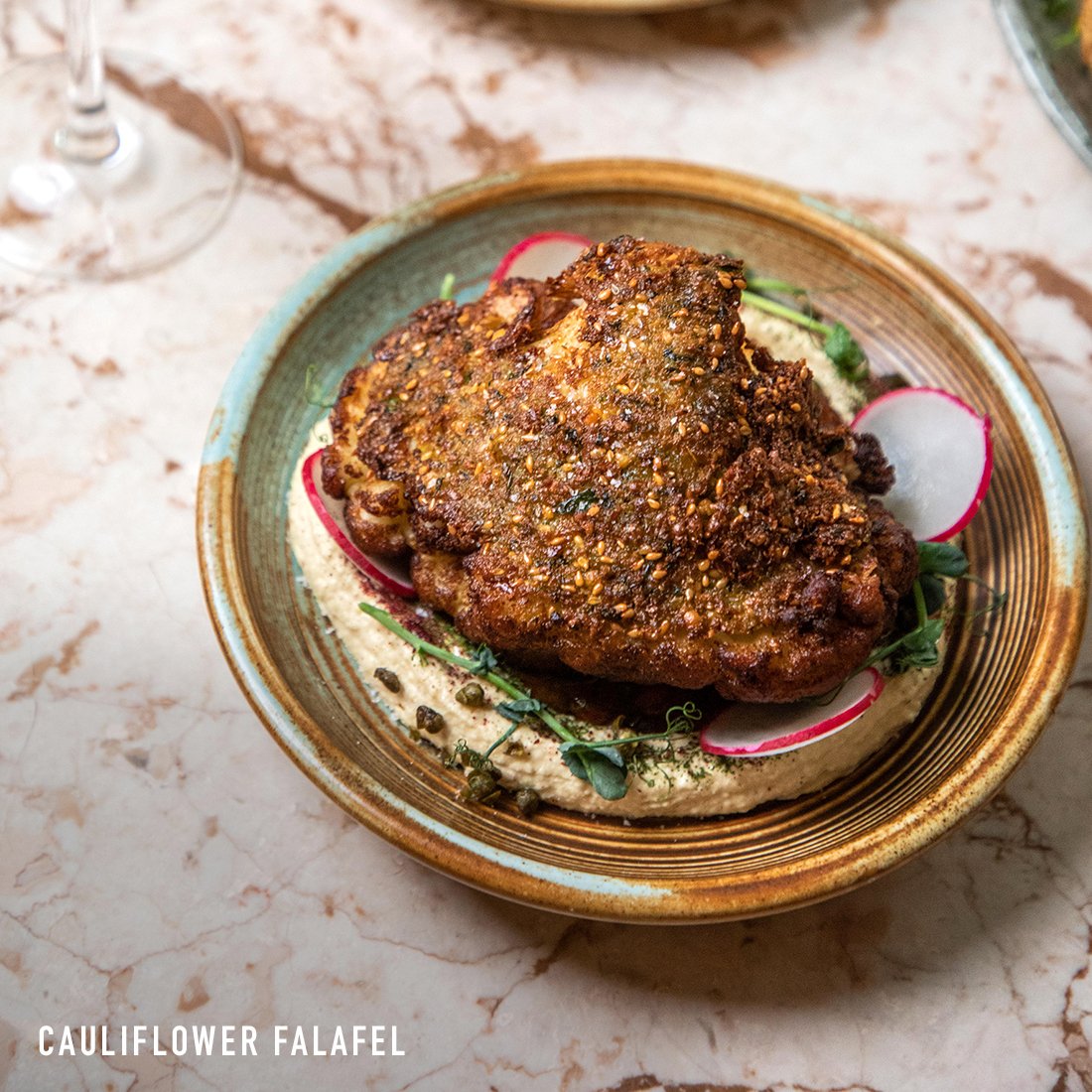  Cauliflower Falafel with creamy hummus, muhammara, crispy falafel crust. Best vegan dish in Sydney, Australia 