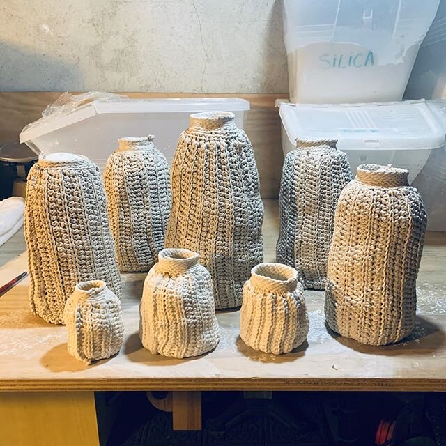 Here are some fired bottles at their usual size. The new ones are much larger. I&rsquo;m excited to see how they turn out! #ceramics #porcelain #clay #porcelainslip #knitting #knit #crocheting #crochet #fibertoclay