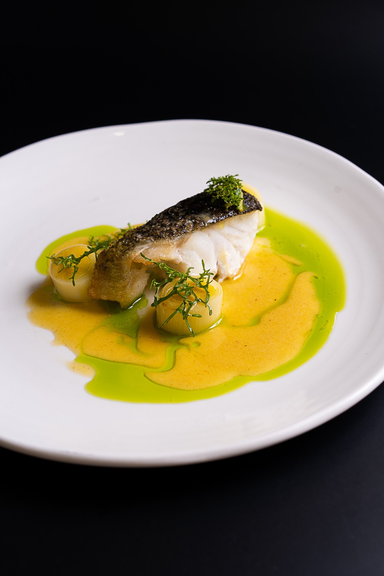 Pesce al forno – Murray cod with leeks and broth.jpg