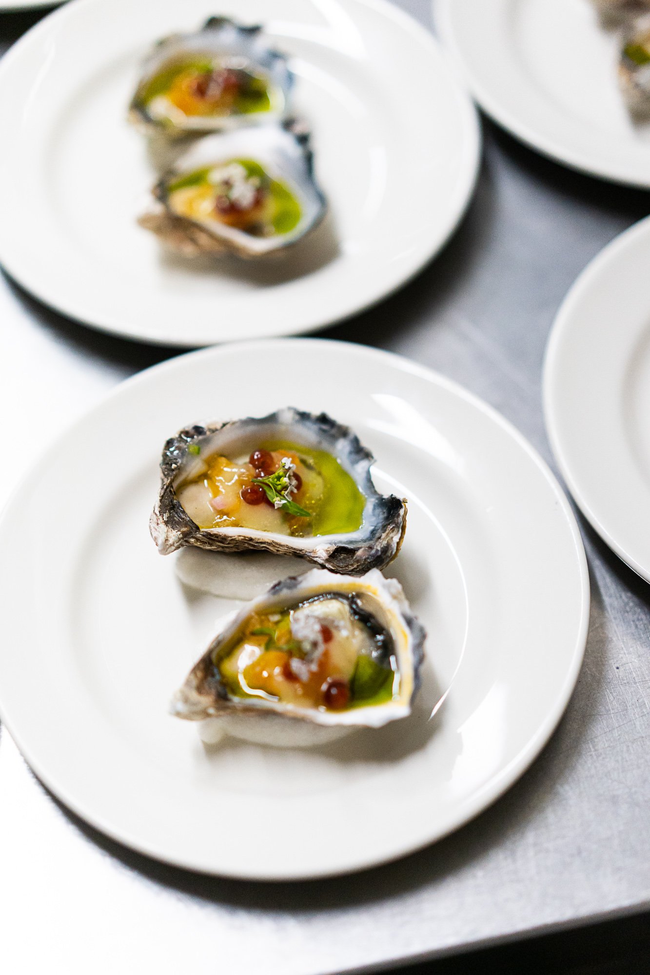 Ostrica con mela - oysters with persimmon, chili and avruga caviar.jpg