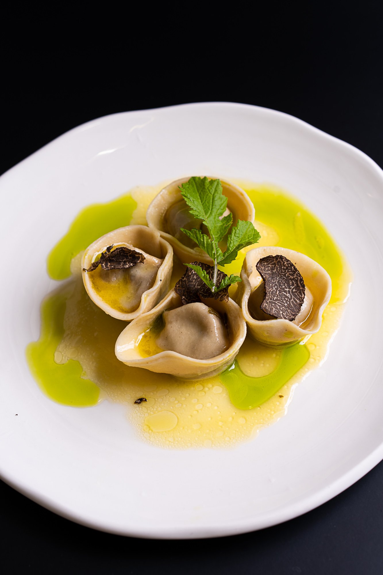 Chestnut cappelletti with veal, porcini, and freshly shaved truffles.jpg