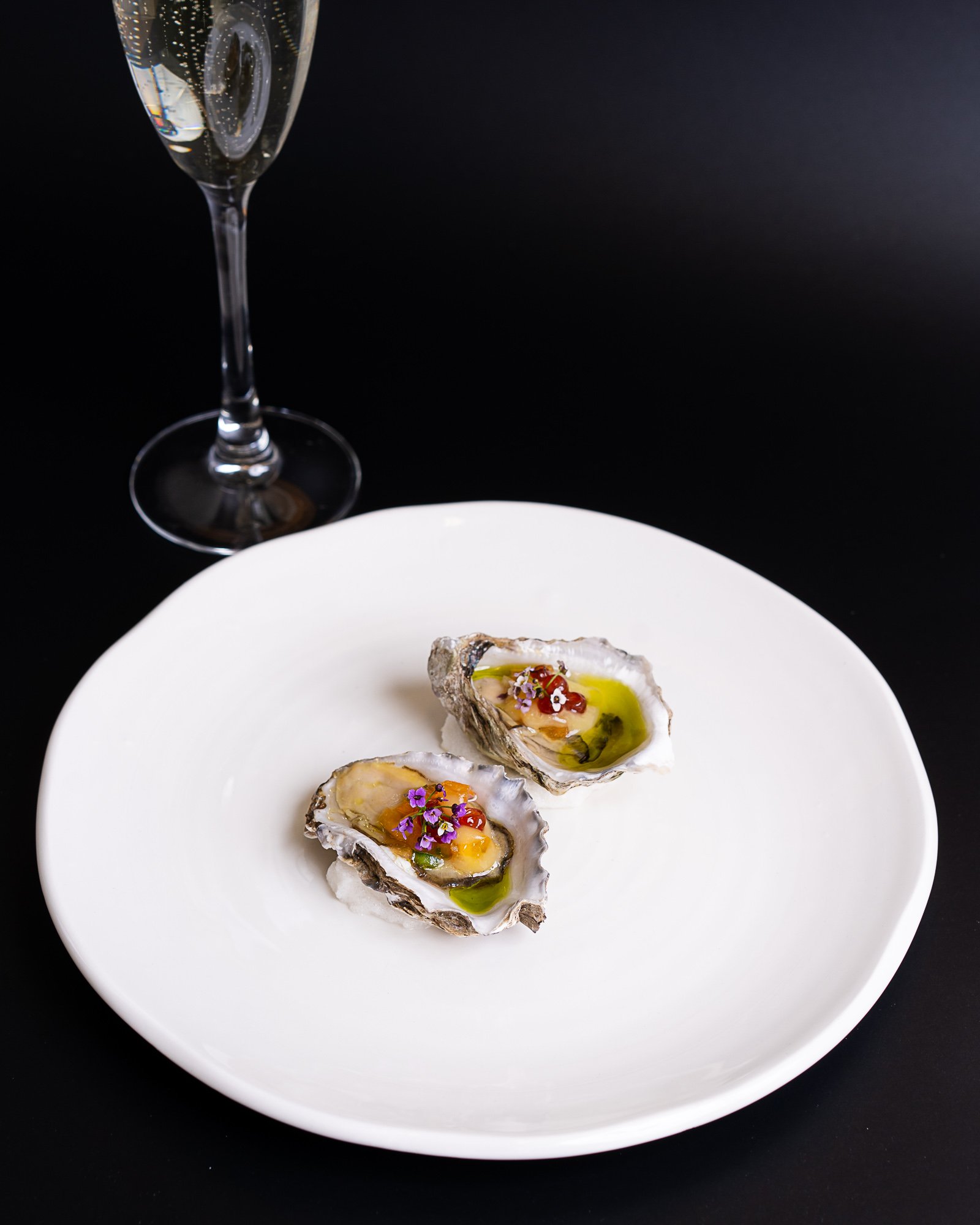 Oysters with persimmon, chili, bloody shiraz and gin caviar.jpg