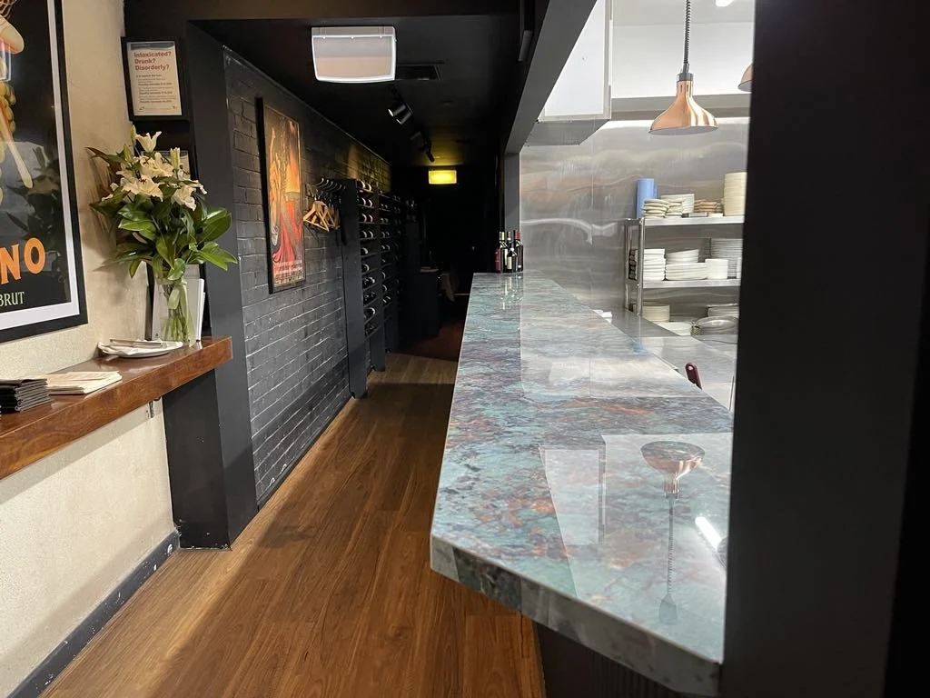 Little Black Pig and Sons seated bar.jpeg