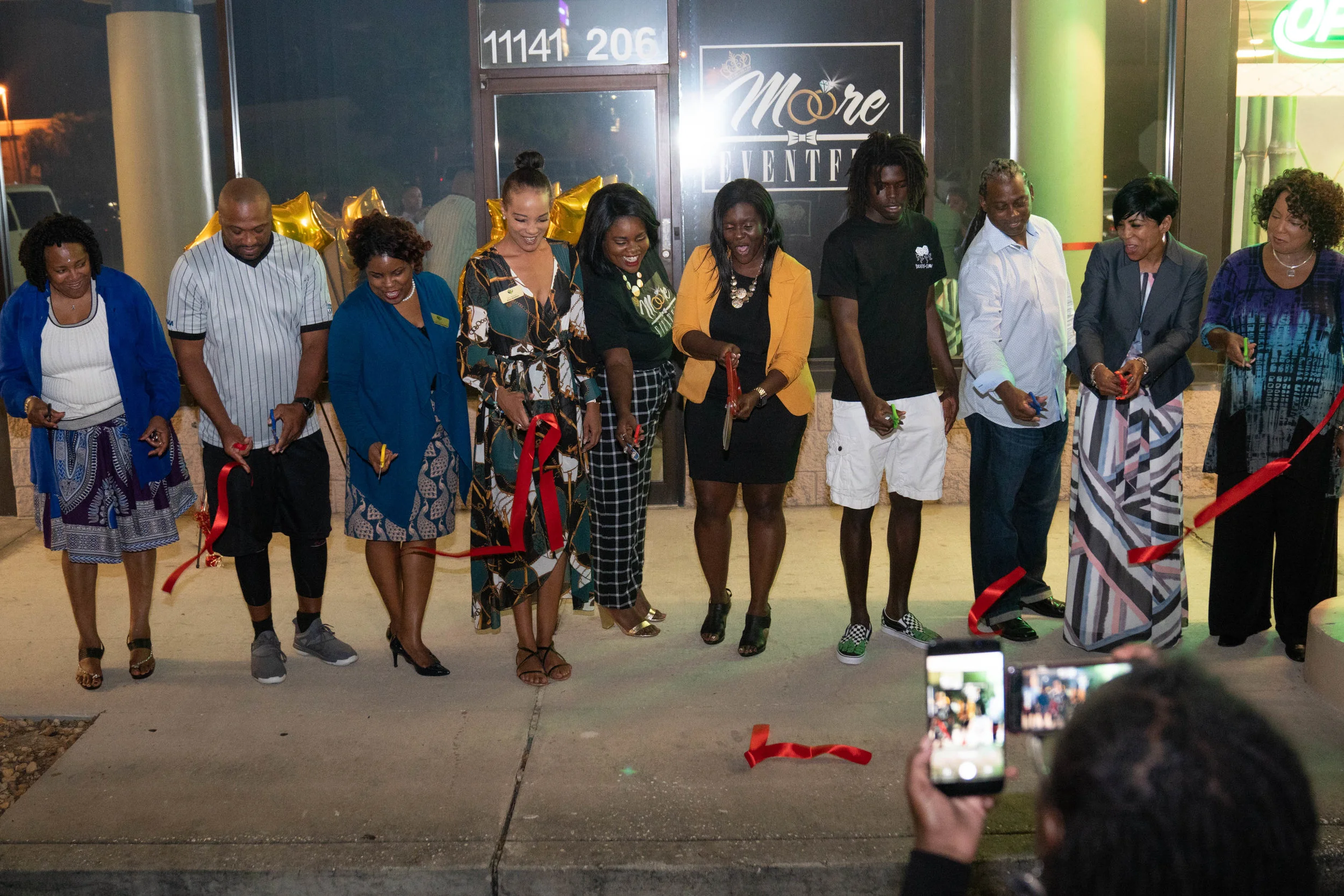 MOORE EVENTFUL RIBBON CUTTING