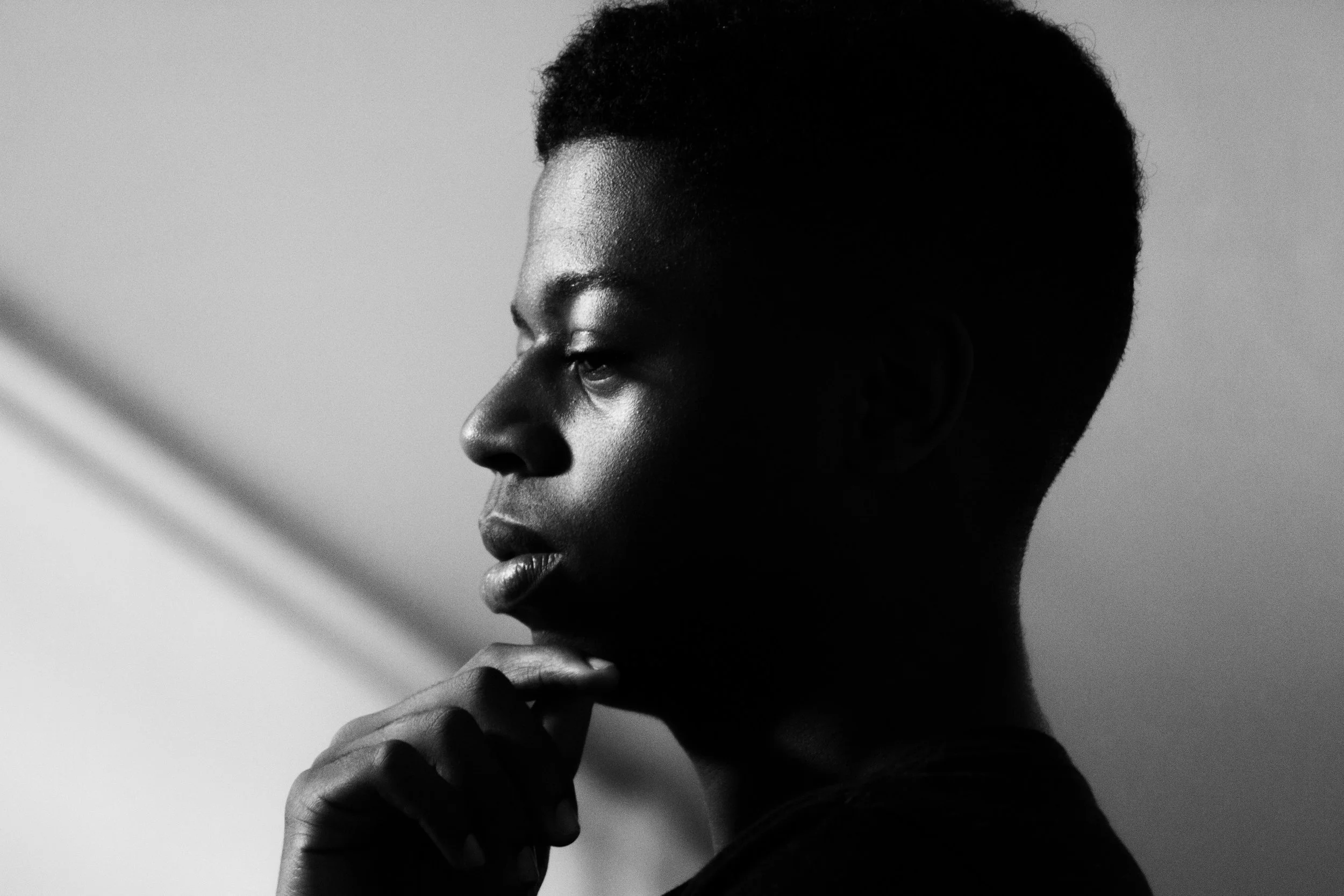 African-American man thinking about mental health