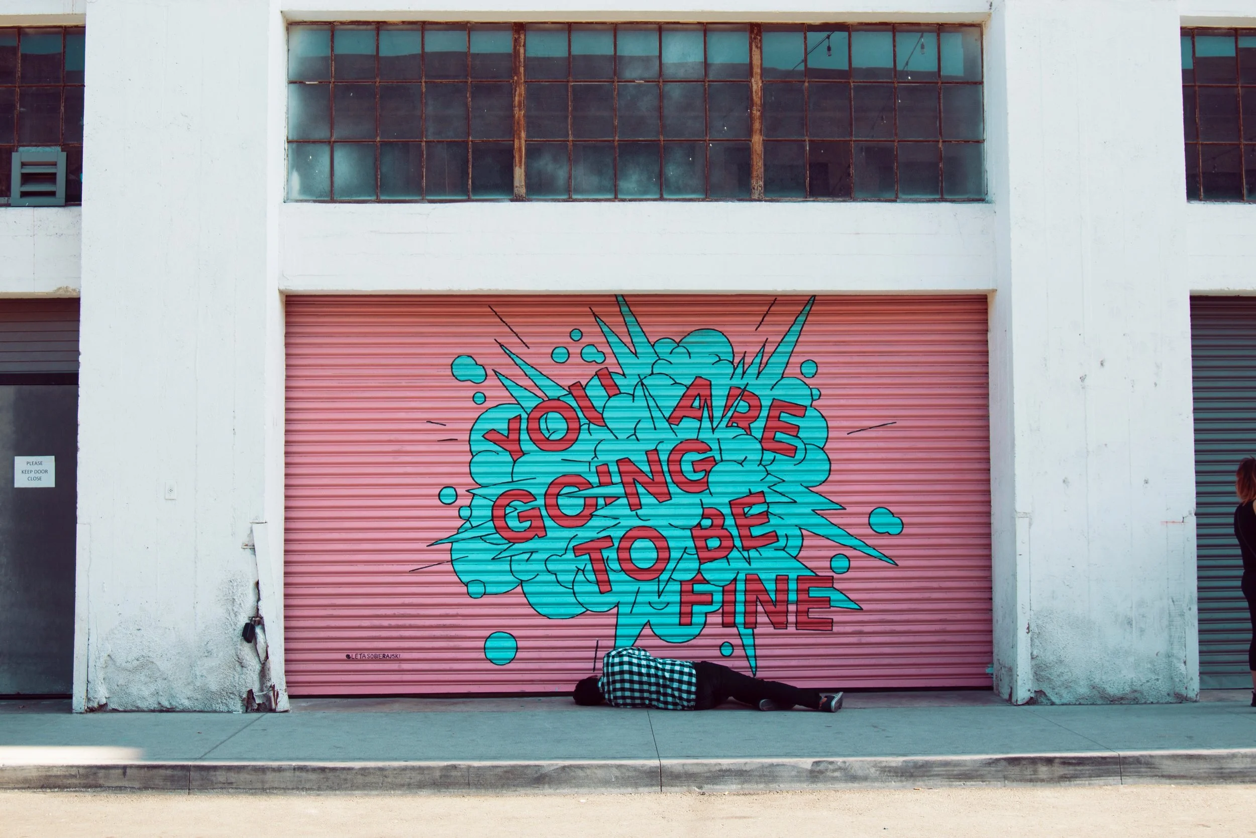mural painted on garage with the words you are going to be fine