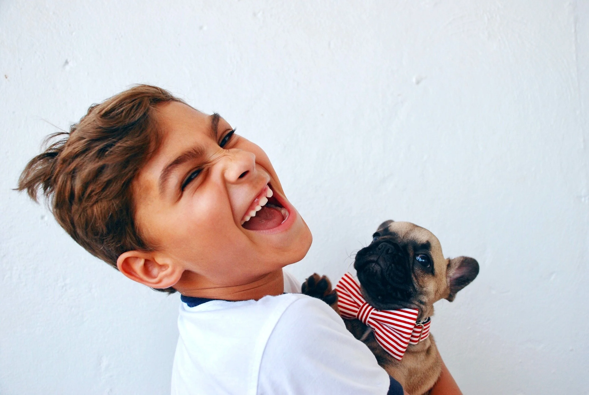 boy with dog being authentic