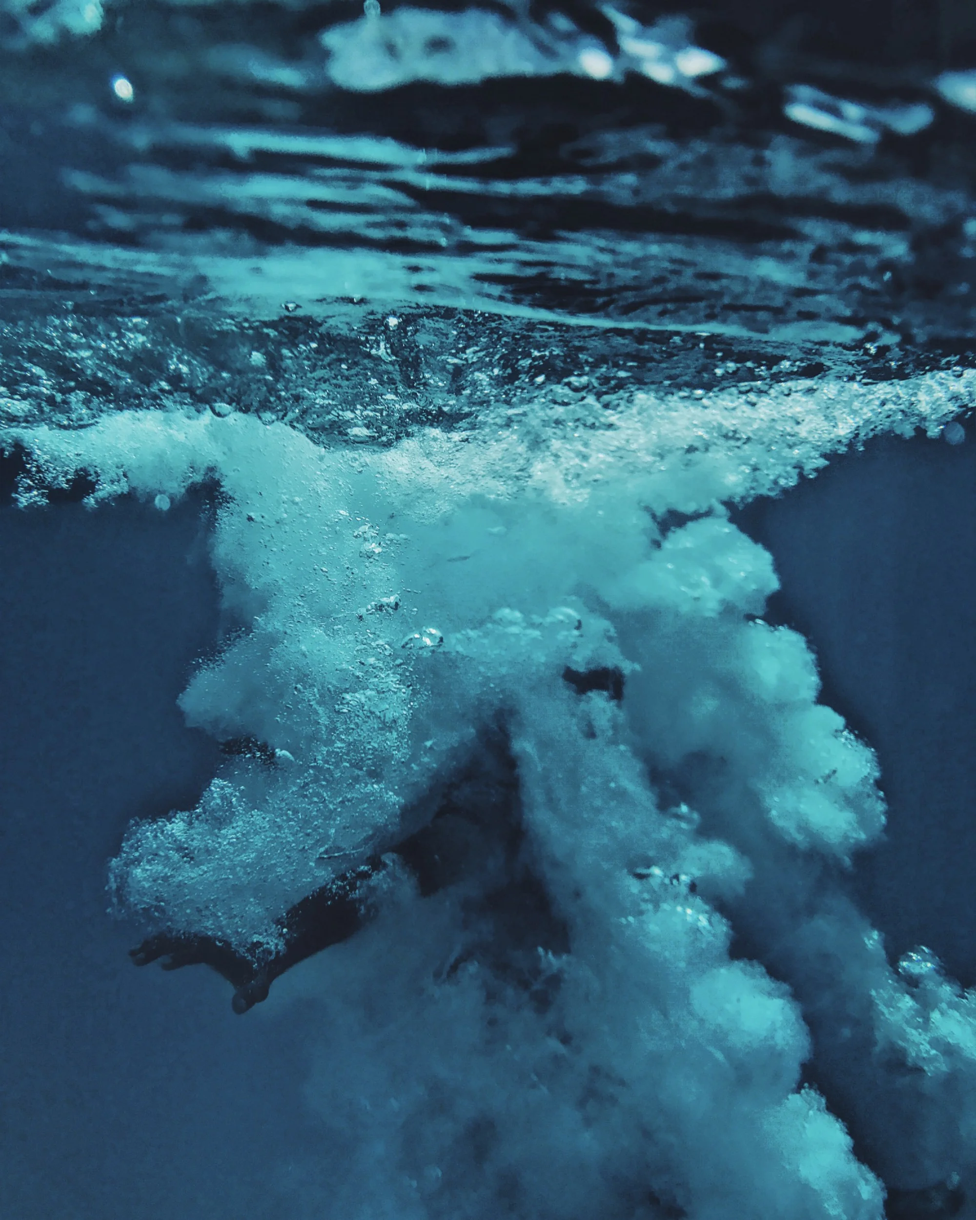 man submerged in water