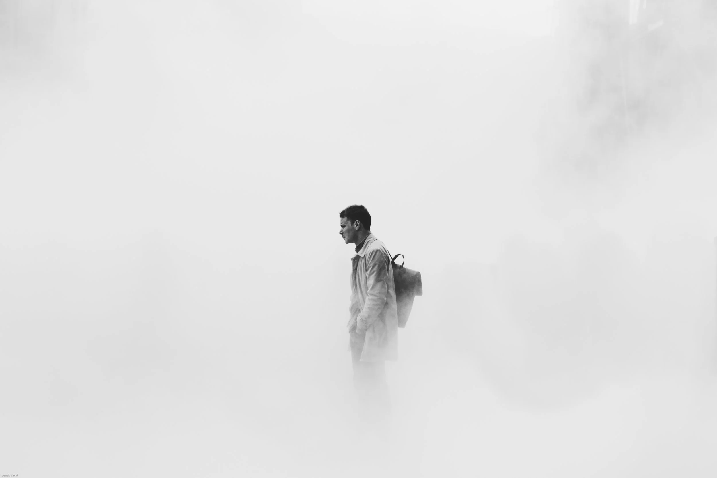 anxious man standing in smoke