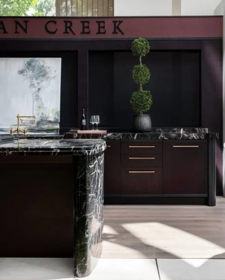 Bold, elegant, and unapologetically current. For @atlantahomesmag&rsquo;s inaugural Atelier, we designed a deep burgundy kitchen that's elevated and luxurious. ✨

Cabinetry and design: @morgancreekcabinetco⁠
Stone: @stoneshowcase, fabricated by @touc