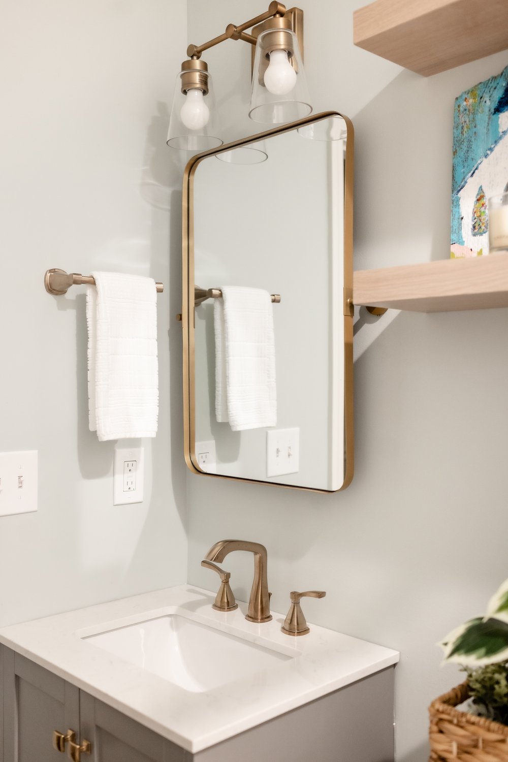  Gray, single sink vanity with bronze accessories 