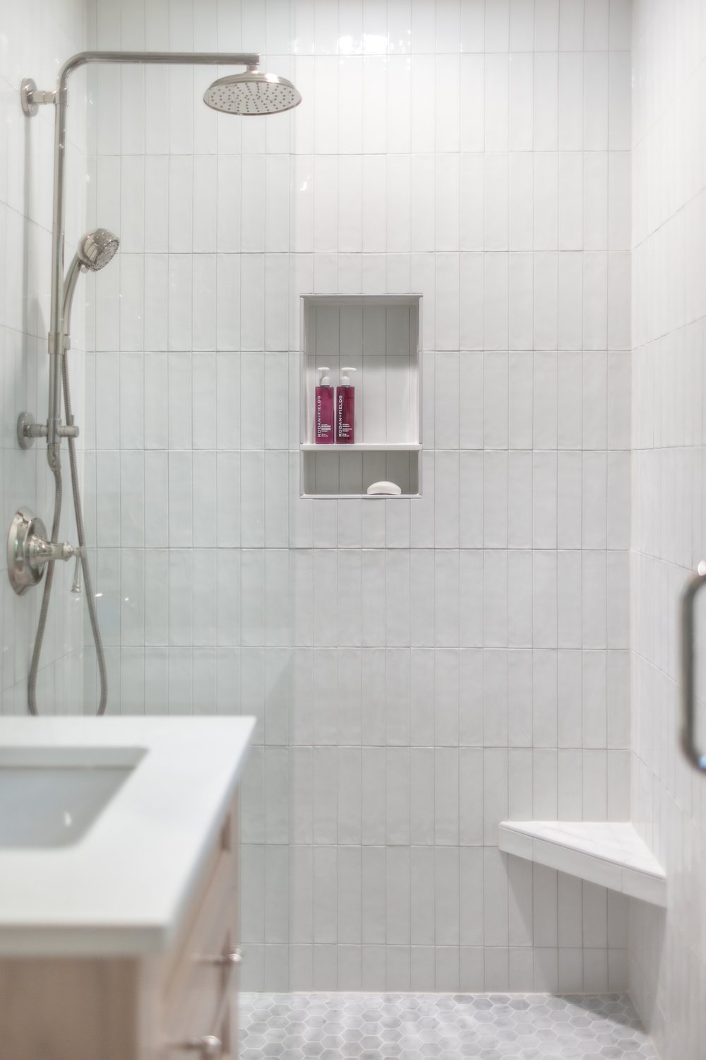  White 2.5” x 10” vertically stacked shower tile 