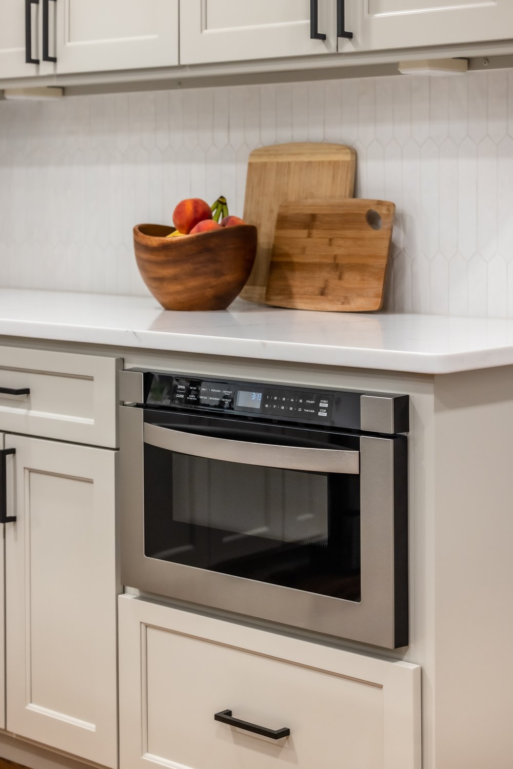 Custom kitchen design with microwave drawer 