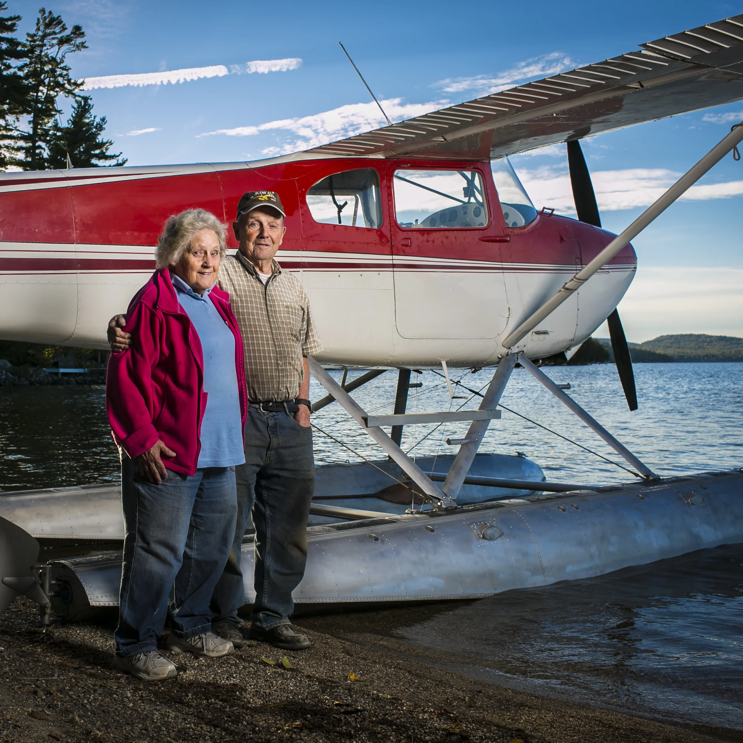 George Dunn and his wife Donna have been together 63 years and living on the pond for more than 45 of those years. George Dunn, 85, has had a lifelong passion for flying. He first got his license in 1952 and now shares that passion with seven other members of his family who fly and own planes, including his son who now flies KC-135s for the Air National Guard in Bangor. He and his family, known as “The Flying Dunn’s,” have been part of the Beech Hill Pond community for several years—Dunn has lived on the pond, year round, for more than 45 years and hosts an annual Fourth of July event at his hanger that draws more than 1,000 people each year.