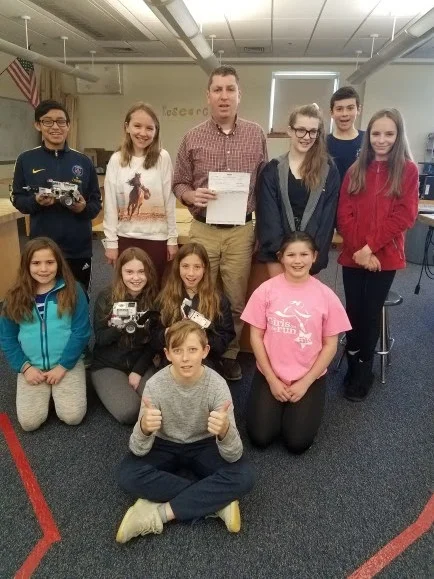 Memorial Middle School recently received a $5,000 Lowe’s Toolbox for Education grant to create a makerspace. Back row, left to right: Dillon Simpson-Sliney, Kaelyn Burke, Brandon Sullivan, Hailey Putnam-Resnick, Oliver Szabo and Meghan McDonald. Second row, left to right: Emma Driscoll, Tallula Clancy, Aalina Colon-Silverman and Marie Marois. Front row: Max Day. (Courtesy Photo Hull Public Schools)