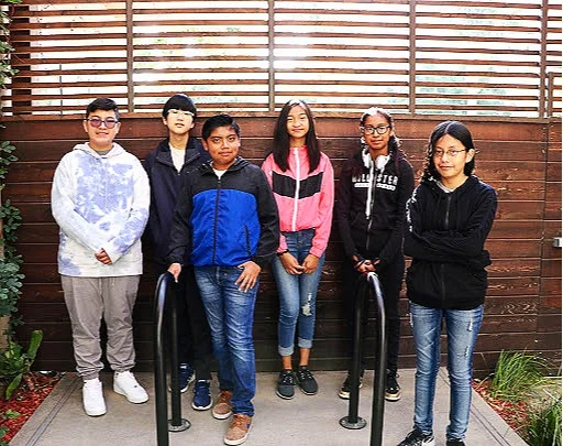 9 Dots AP CSP course participants and test takers in 9 Dots courtyard, July 2019