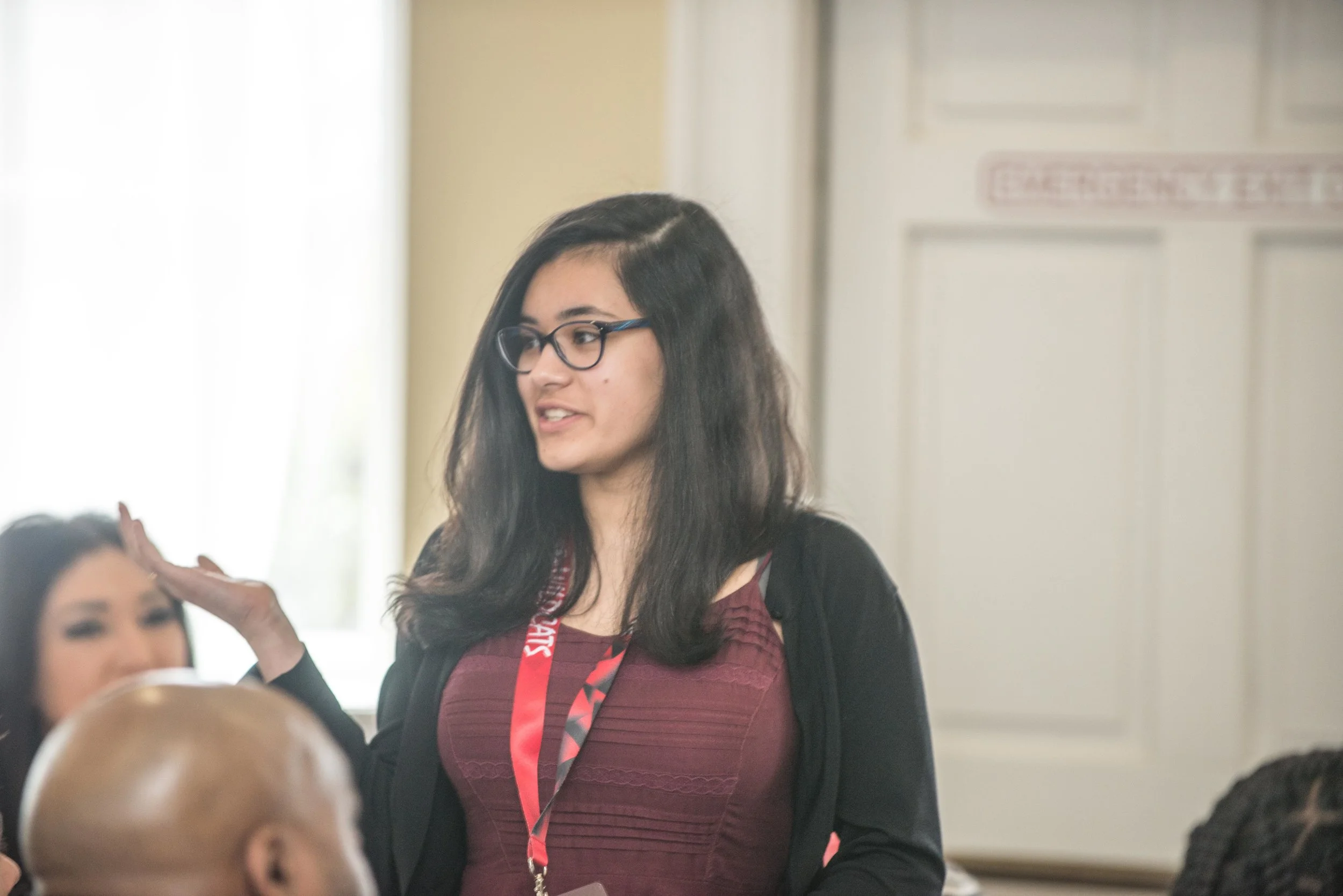 Fellows introduce themselves to the room