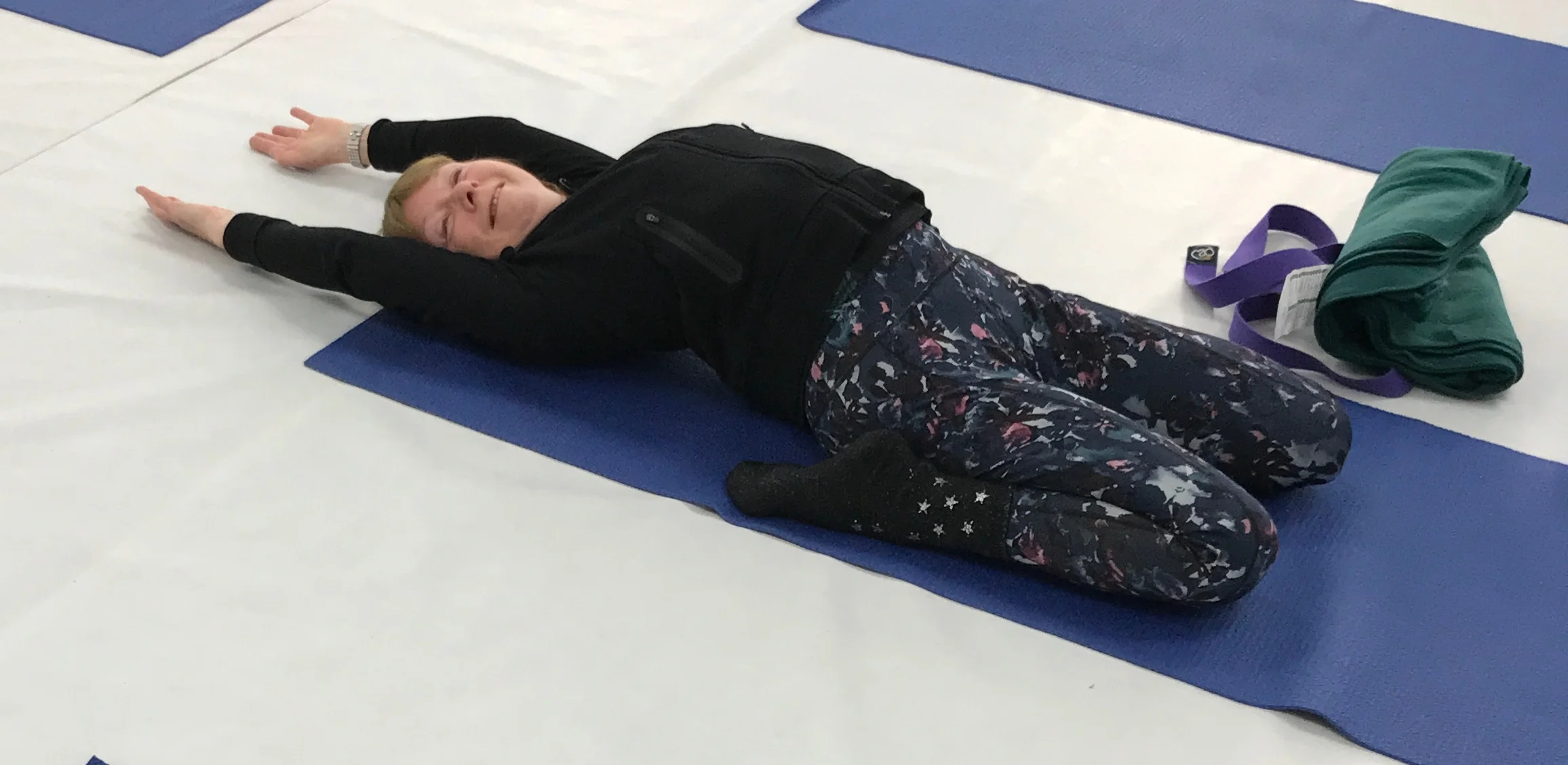 Linda in reclined hero pose. This is a strong pose for the tops of the knees, thighs and lower back. 