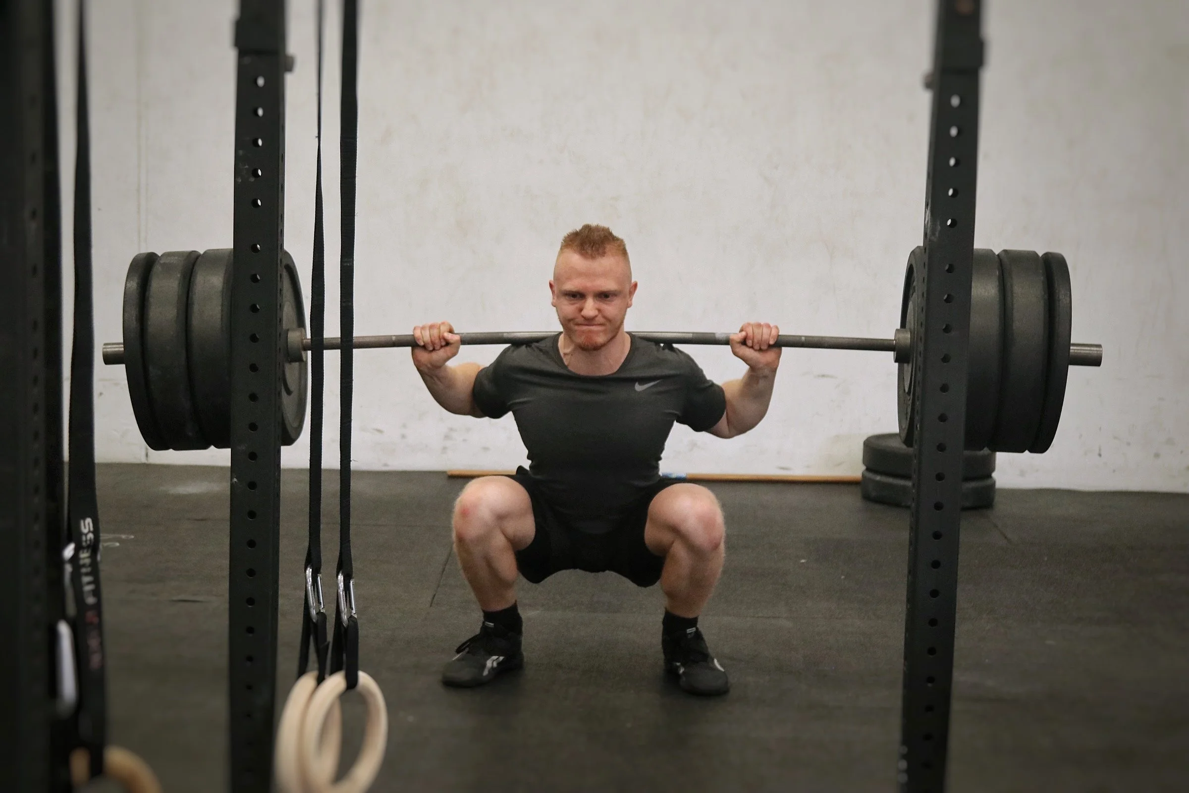 Squatting CrossFit Accelerate Strength
