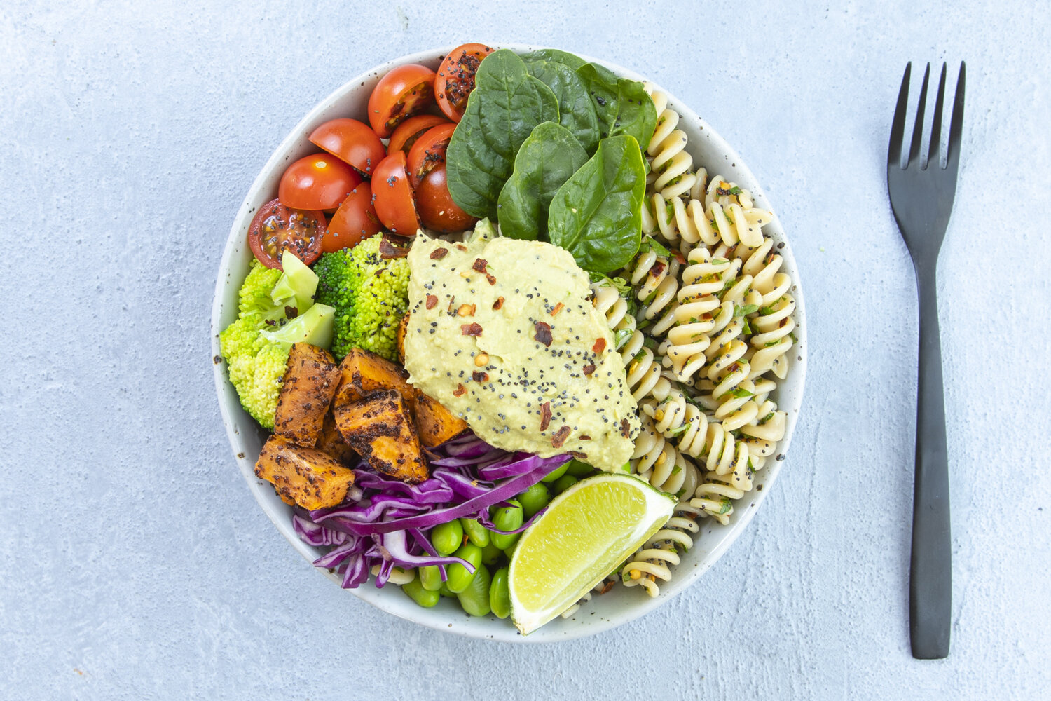 Nourish-Bowl-Pesto-Spelt-Spirals-Avocado-1500pxX1000px.jpg