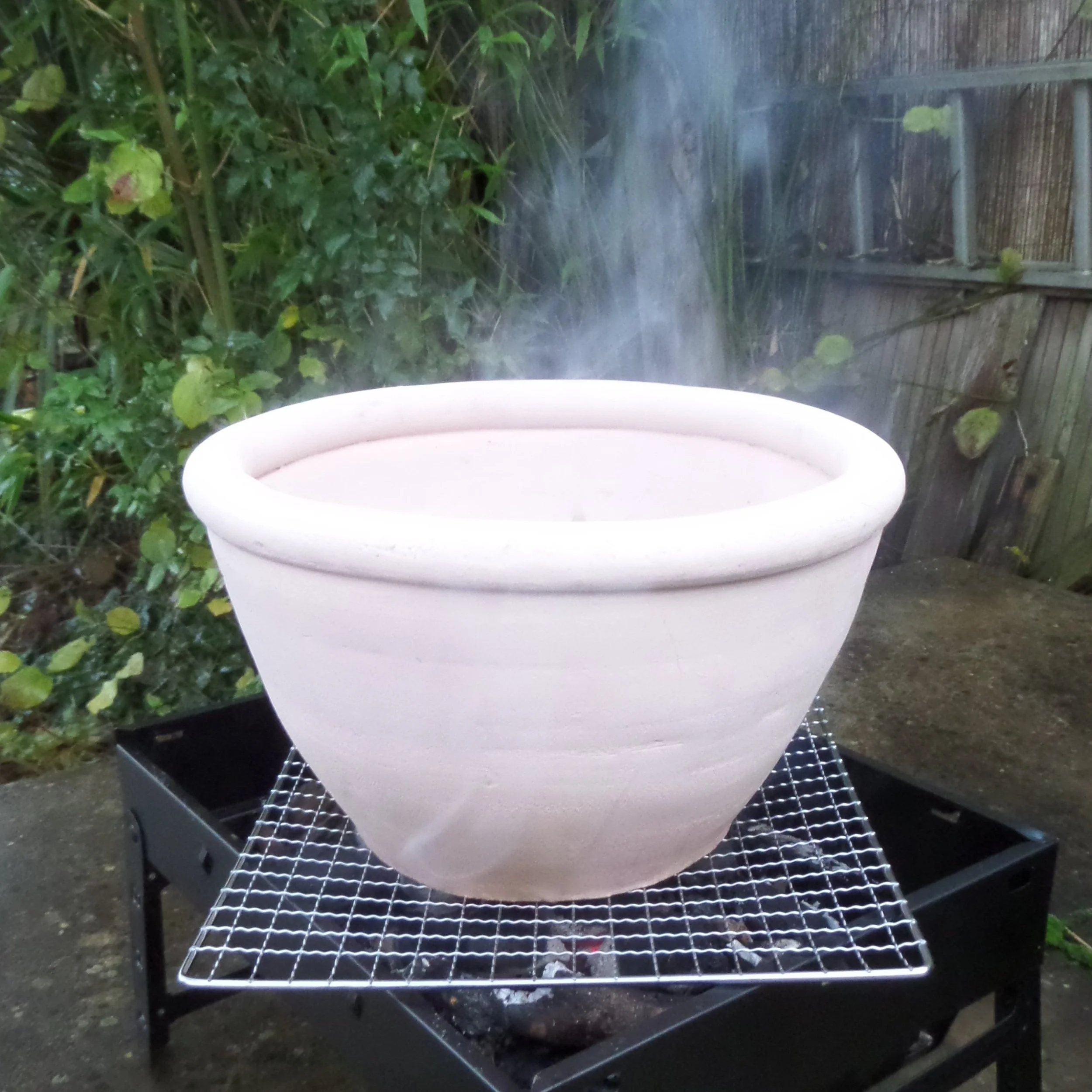 Finished coiled terracotta dye pot