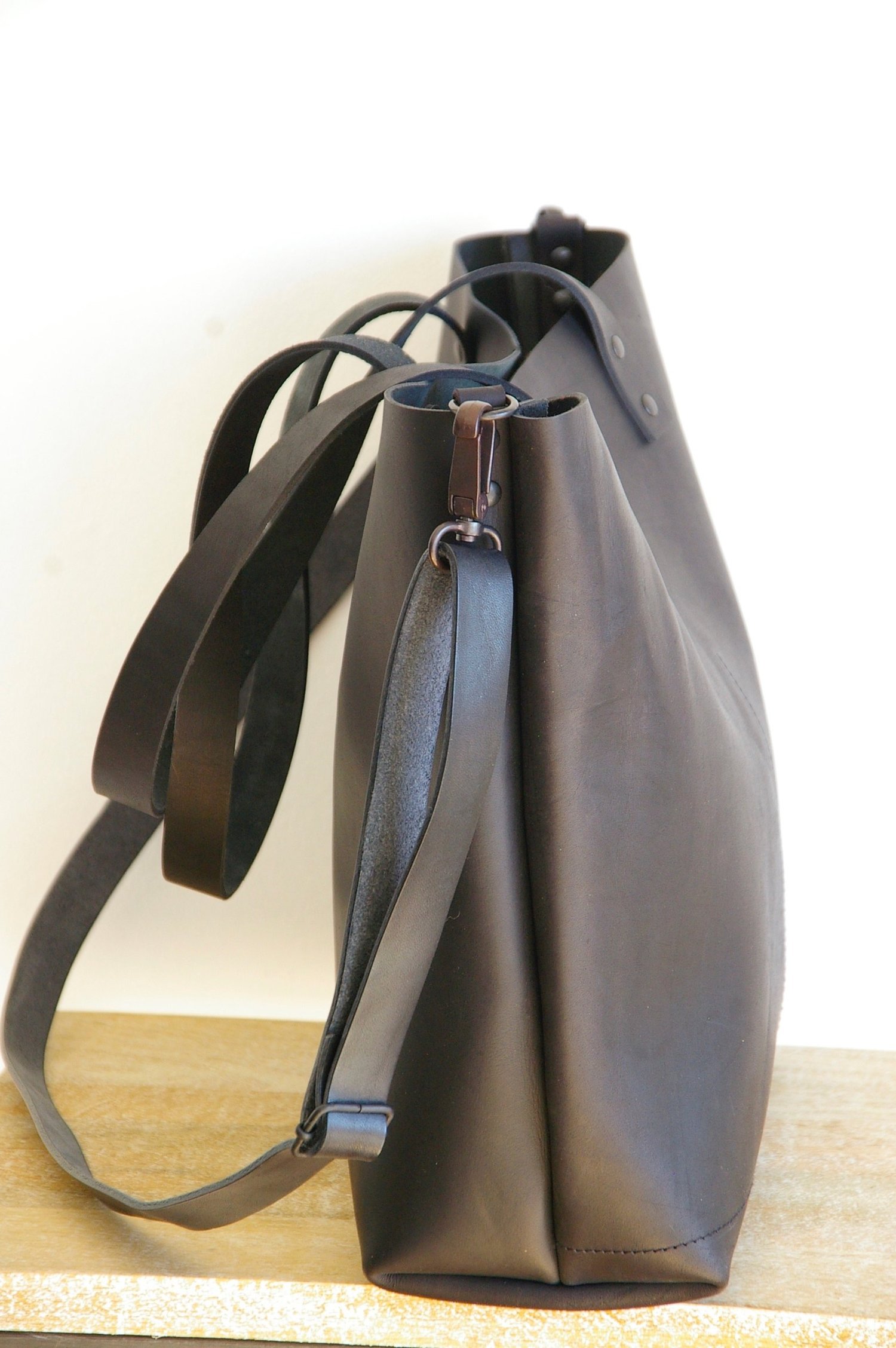 Large Black leather bag with rivets. Cap sa Sal bag collection