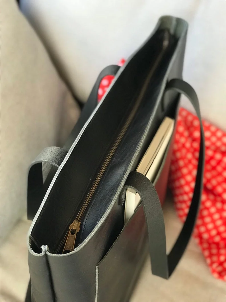 black purse with outside pockets