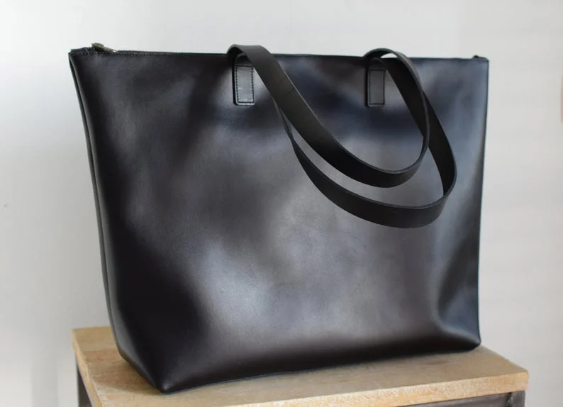 oversized black handbag