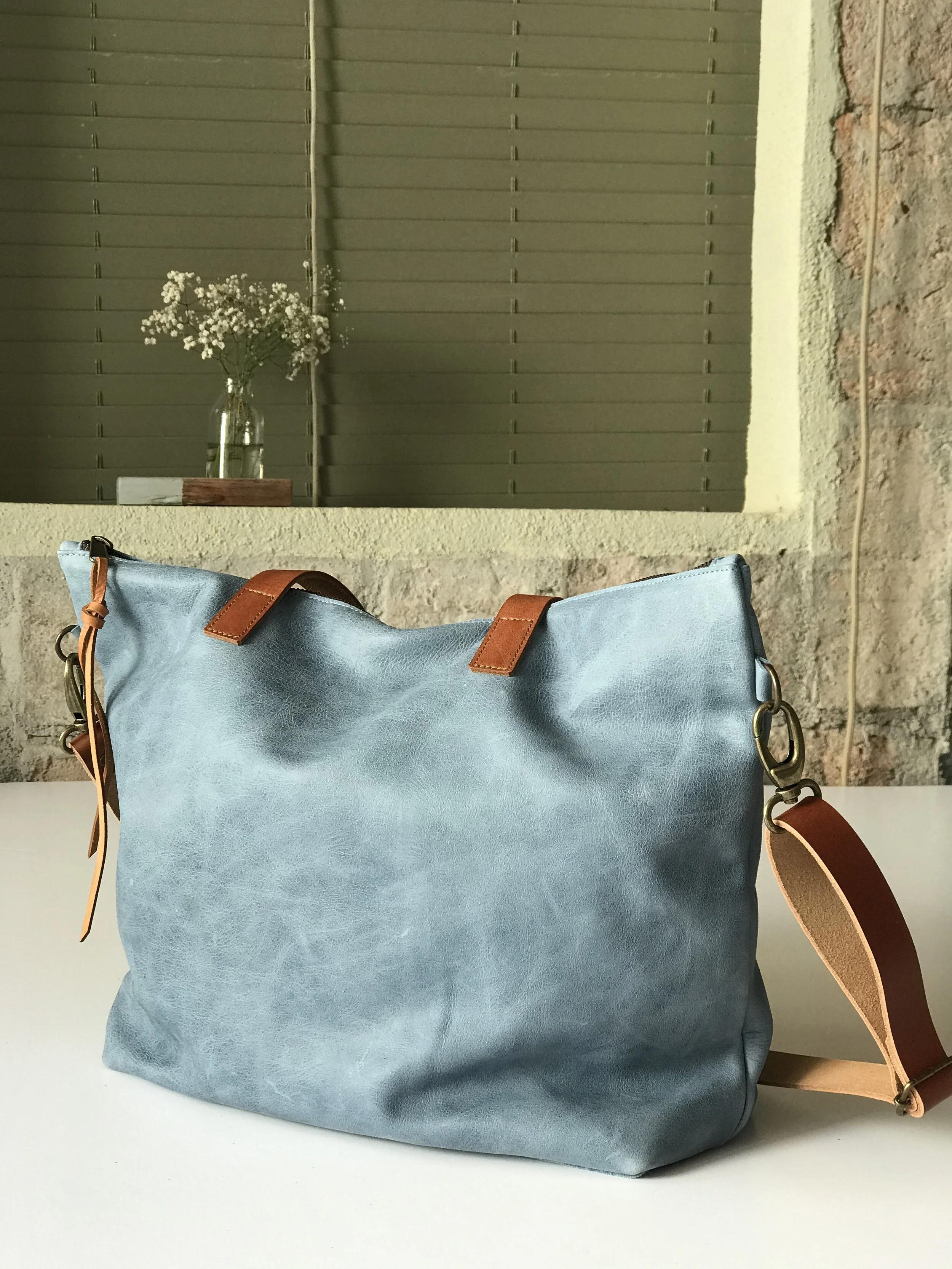 blue leather handbag