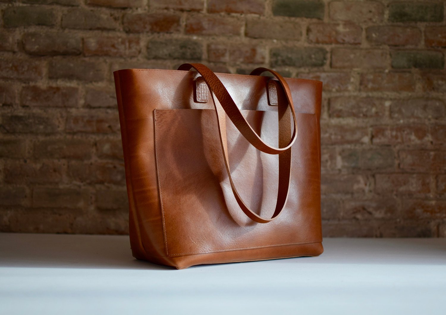 Tan / Cognac Leather tote bag with large outside pocket. The COGNAC/TAN  from the Cap sa Sal collection bag. — Vermut Atelier