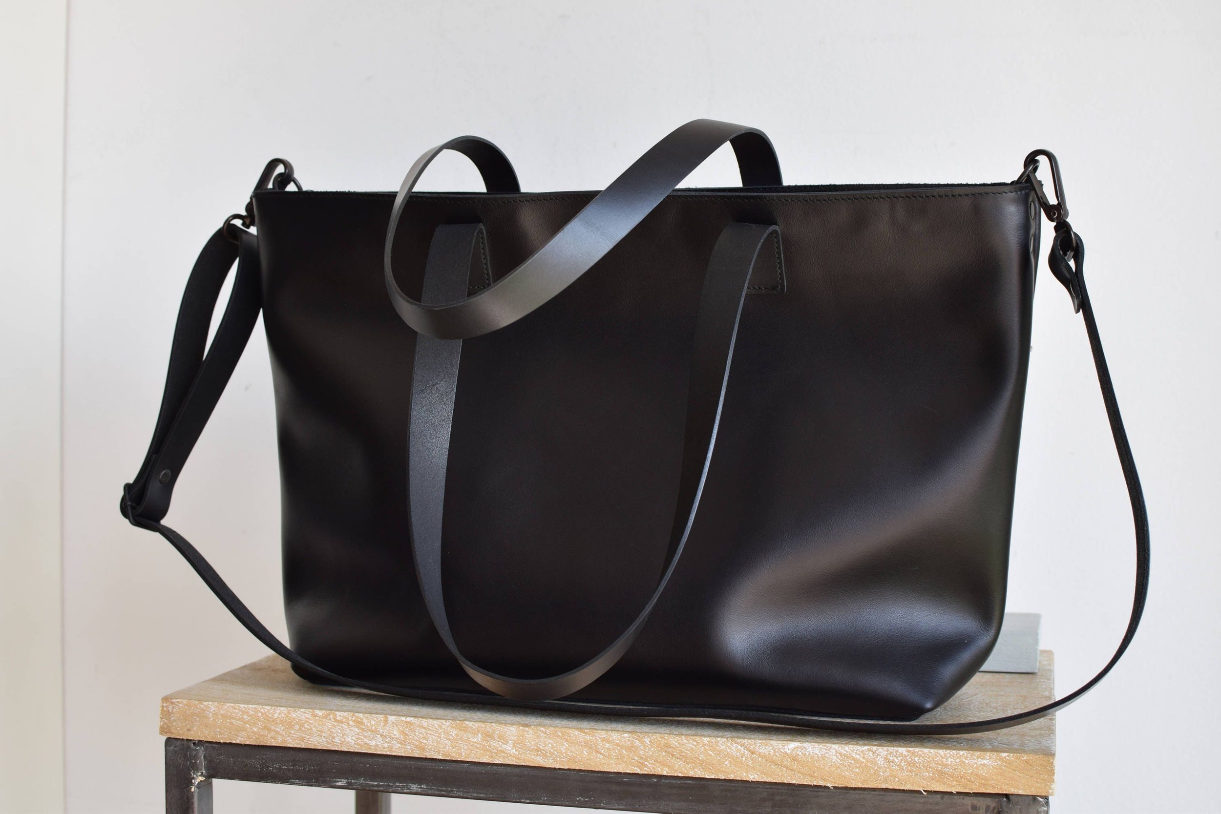 black handbag with zip