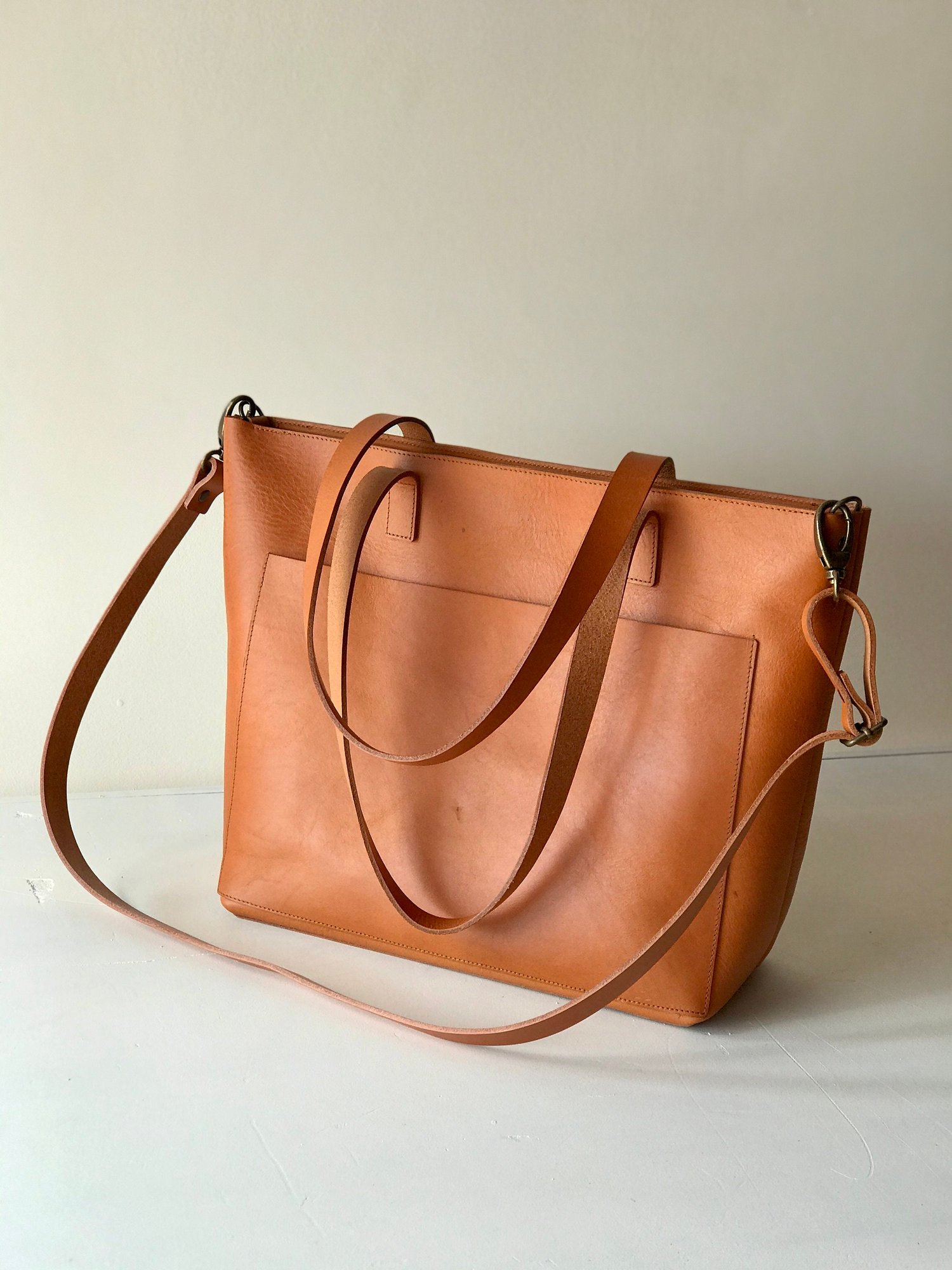 Veg tanned leather bag available in 4 colors. Leather tote with large  outside pocket. Cap Sa Sal Collection. 3 sizes. Handmade. — Vermut Atelier
