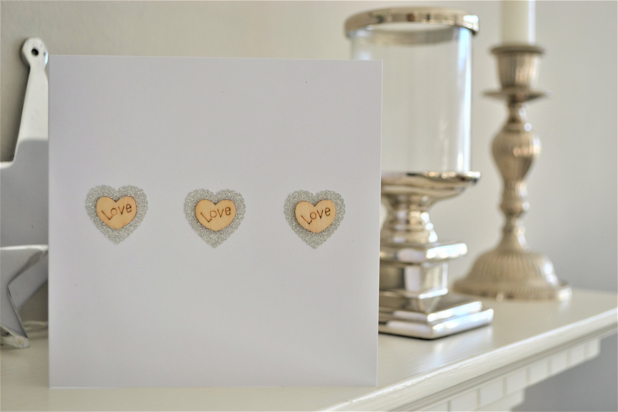 Trio of Silver and Wooden Hearts
