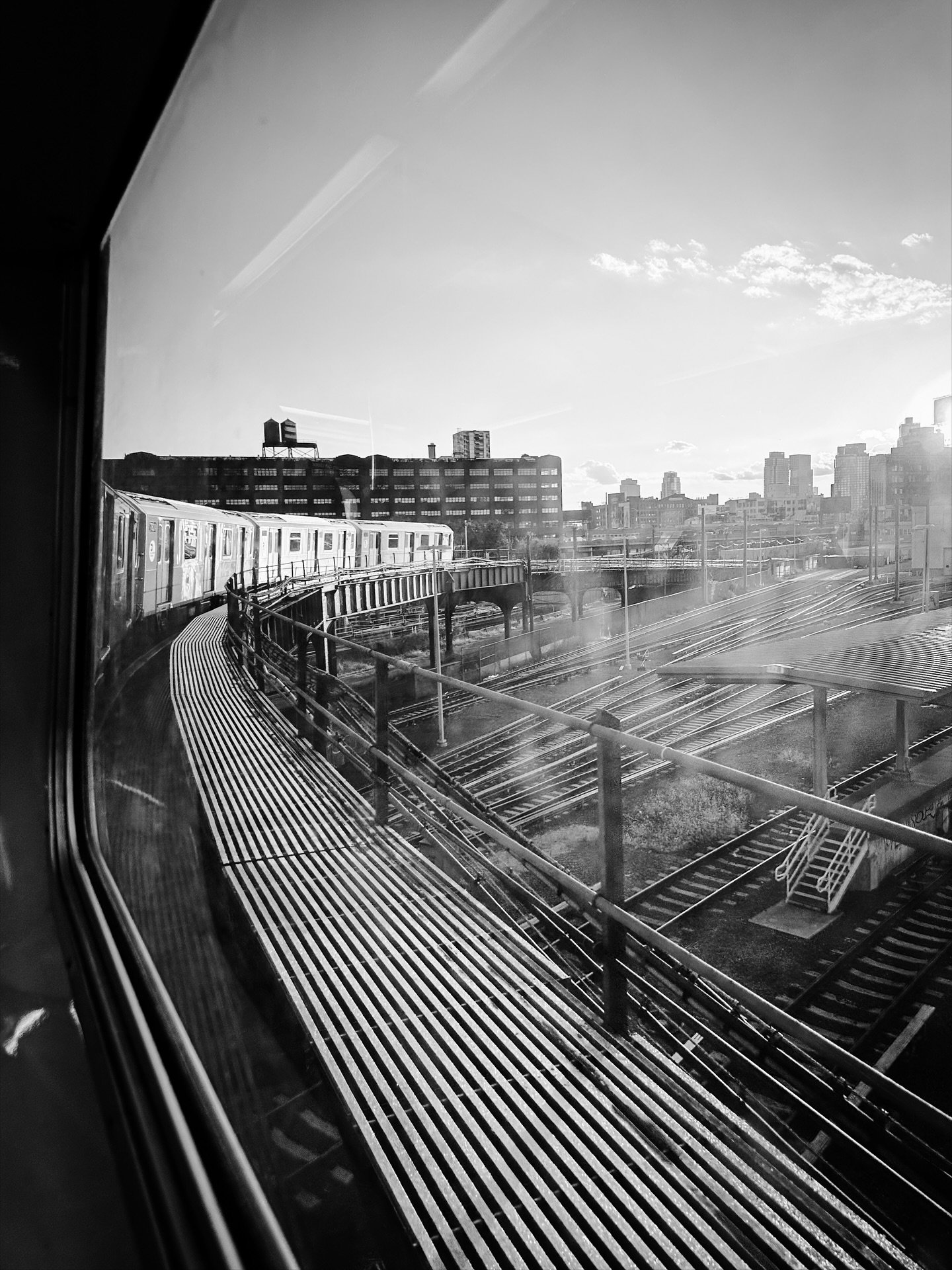 Train view, Queens, NY #queensny #nyc #subway #train #view #sunset #city #blackandwhitephotography #blackandwhite