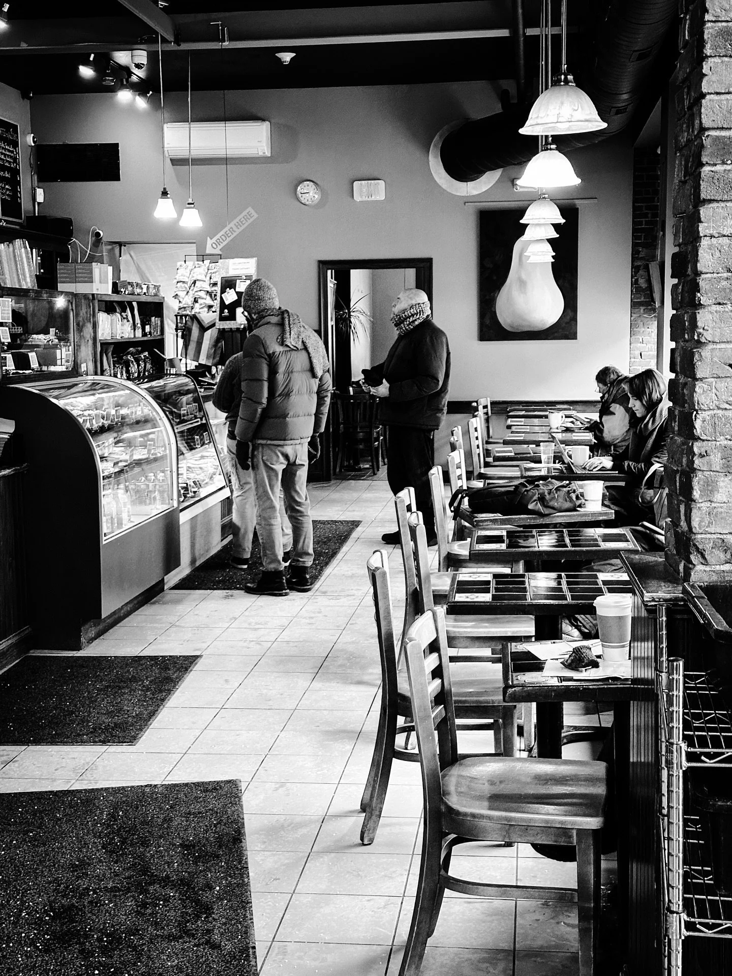 Chocolate croissant time @woodstarcafe #cafe #cafes #blackandwhitephotography #blackandwhite #blue #winter #cafelife #architecture