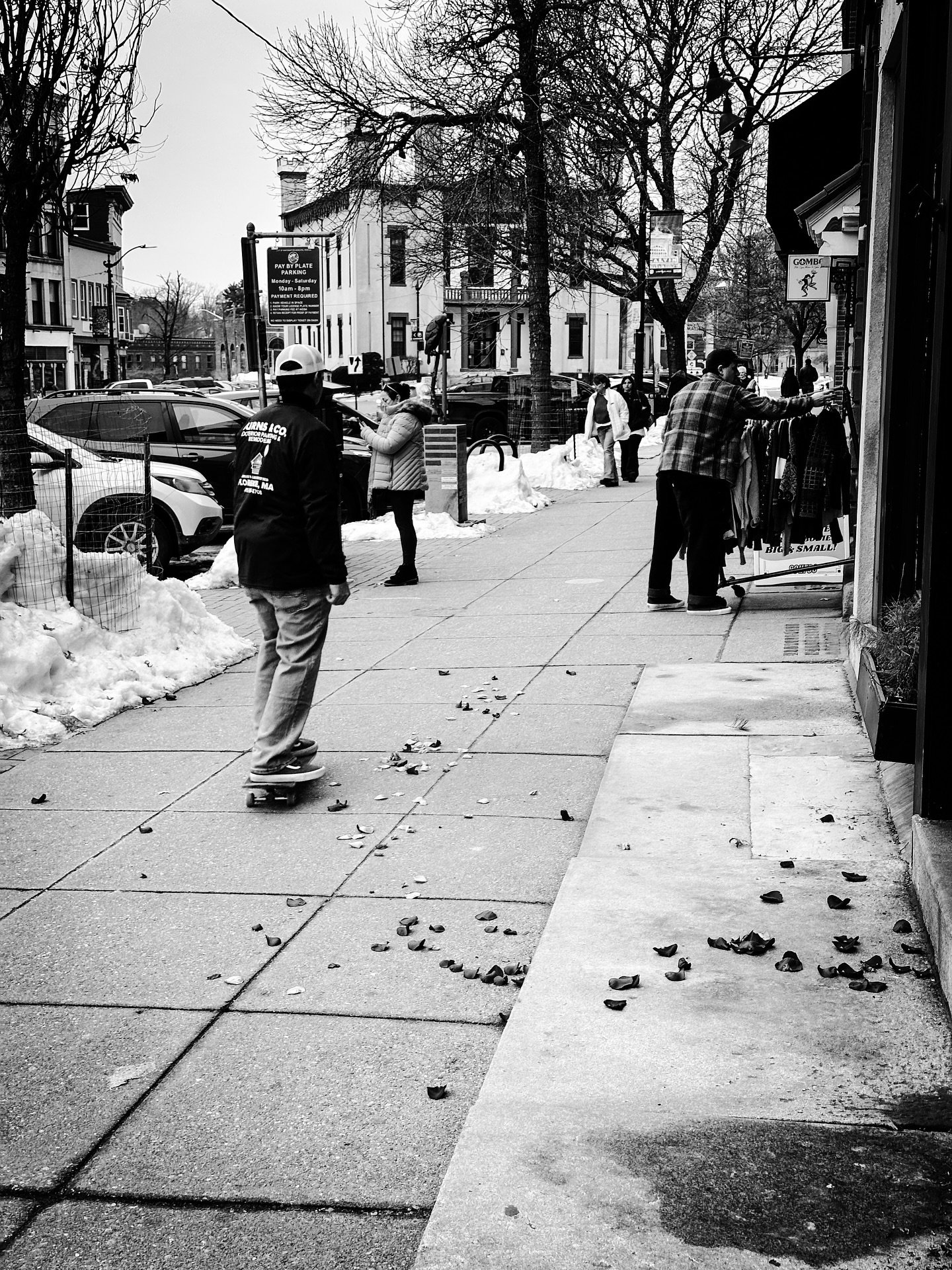 Rose petals- street photo #streetphotography #streetphotos #streetstyle #blackandwhitephotography #blackandwhite #colorsplash #skateboarder