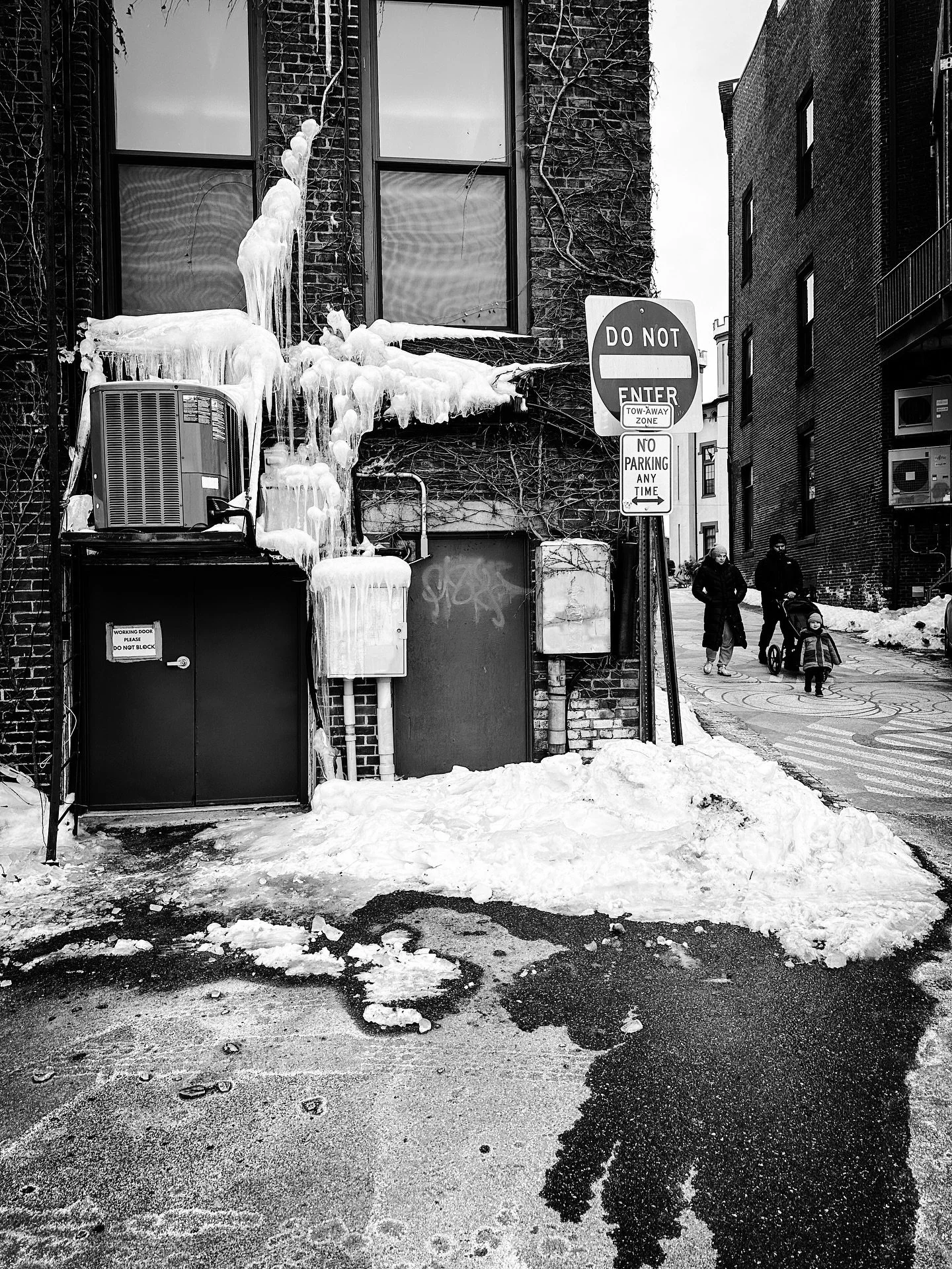 Icy street view #icy #icicles #blackandwhite #blackandwhitephotography #streetphotography #streetphotos #architecture #timeless #winter