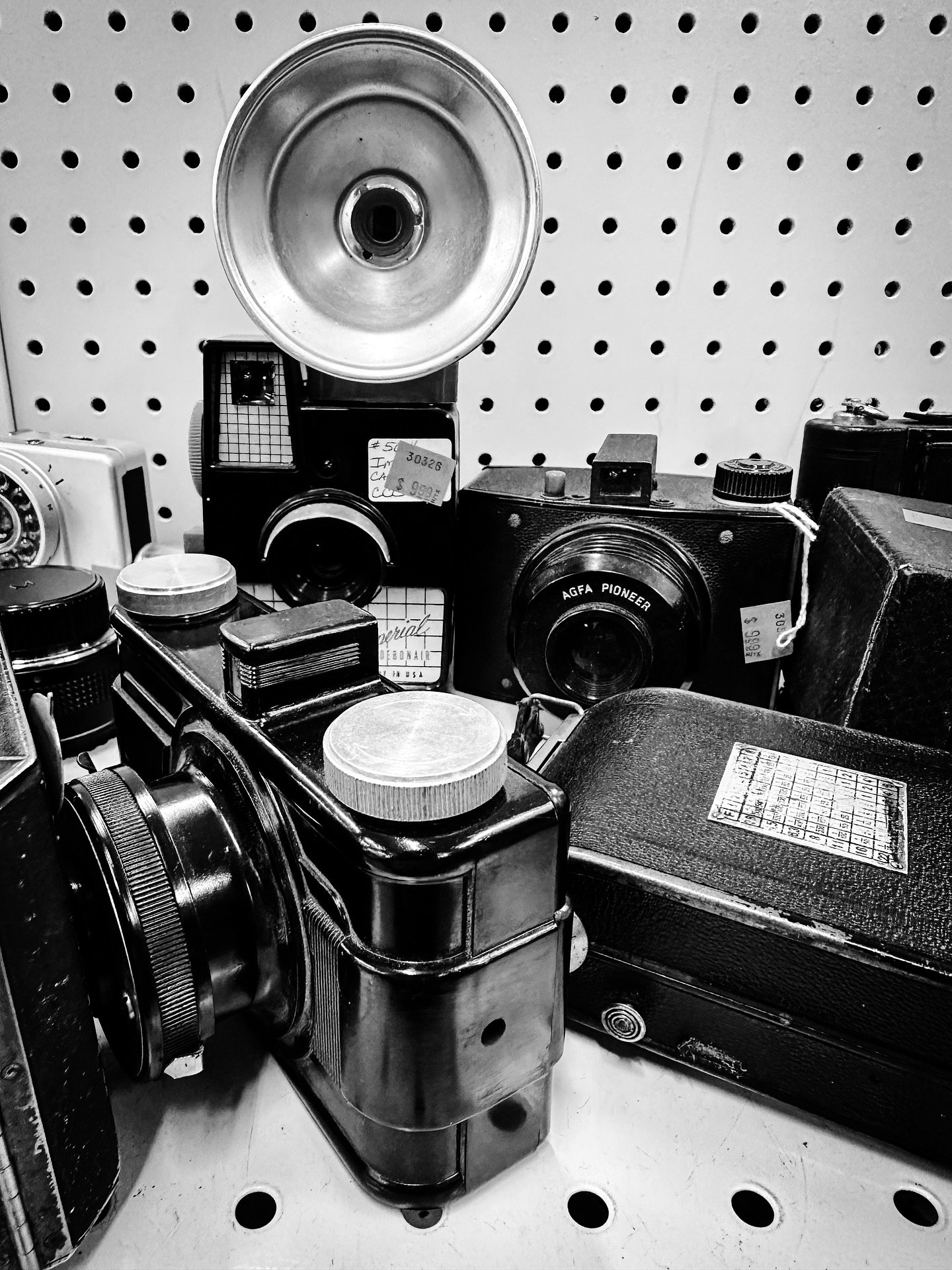 Cameras treasure trove @ Goodwill #cameras #retro #vintage #blackandwhitephotography #blackandwhite #antiques #antique #camera #film #filmcamera