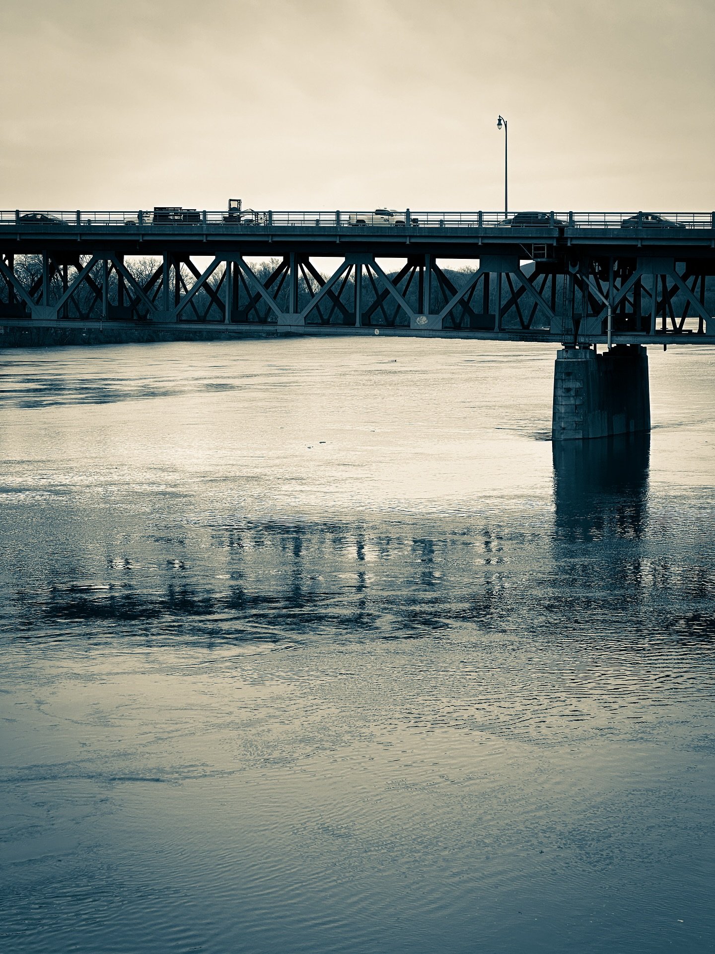 Bike bridge views #view #views #sepia #cyan #cloudy #cloudyday #architecture #bridge #river #blackandwhitephotography #blackandwhite #streetphotography #streetphotos