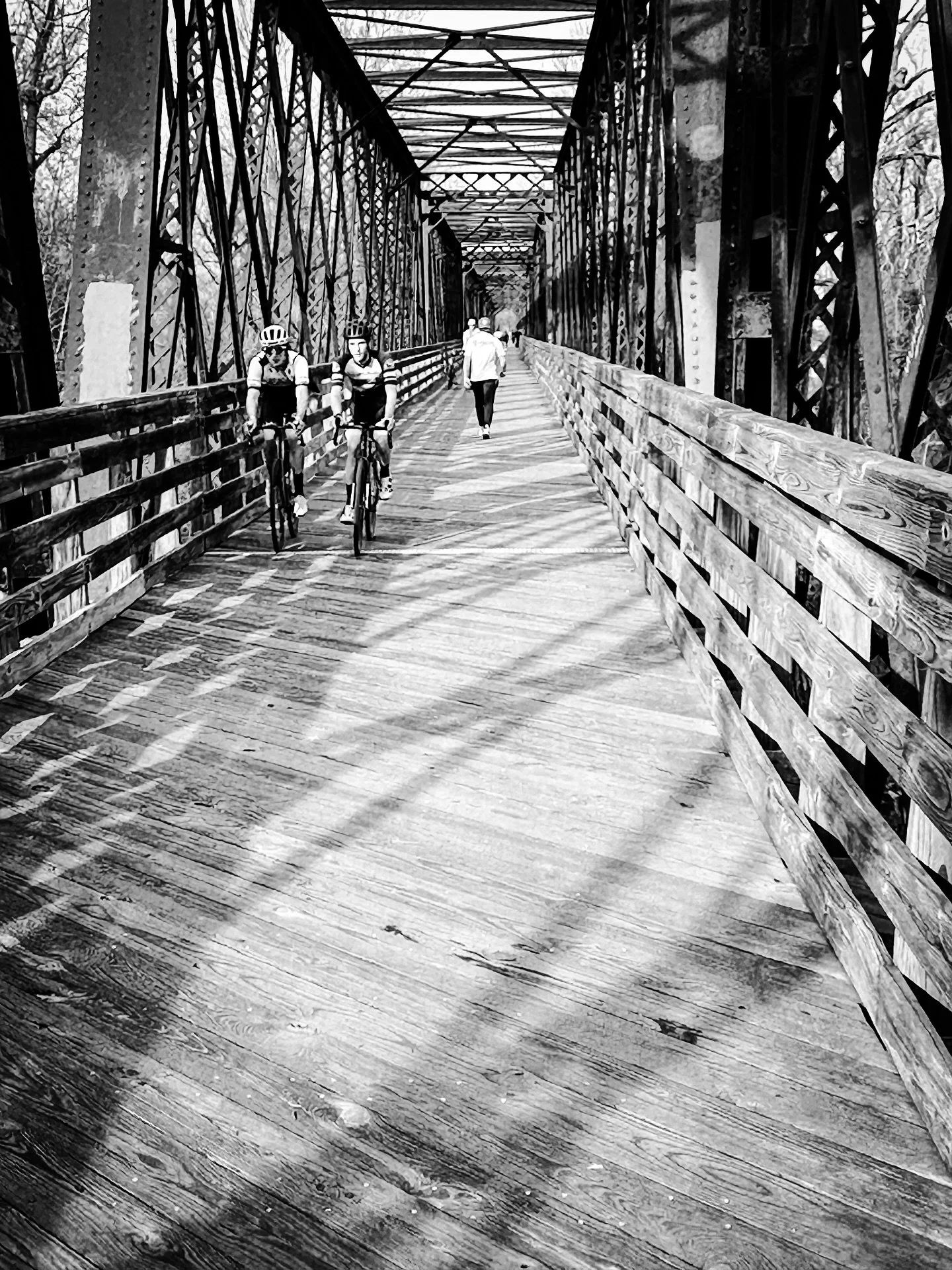 After the rain #bikes #bikebridge #bikepath #blackandwhite #blackandwhitephotography #architecture #walking #walk #spring #shadows