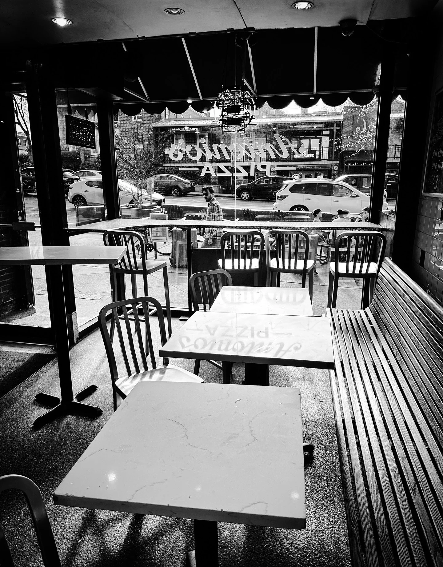 Window view @antoniospizza #blackandwhitephotography #blackandwhite #pizzajoint #restaurant #streetphotos #streetphotography
