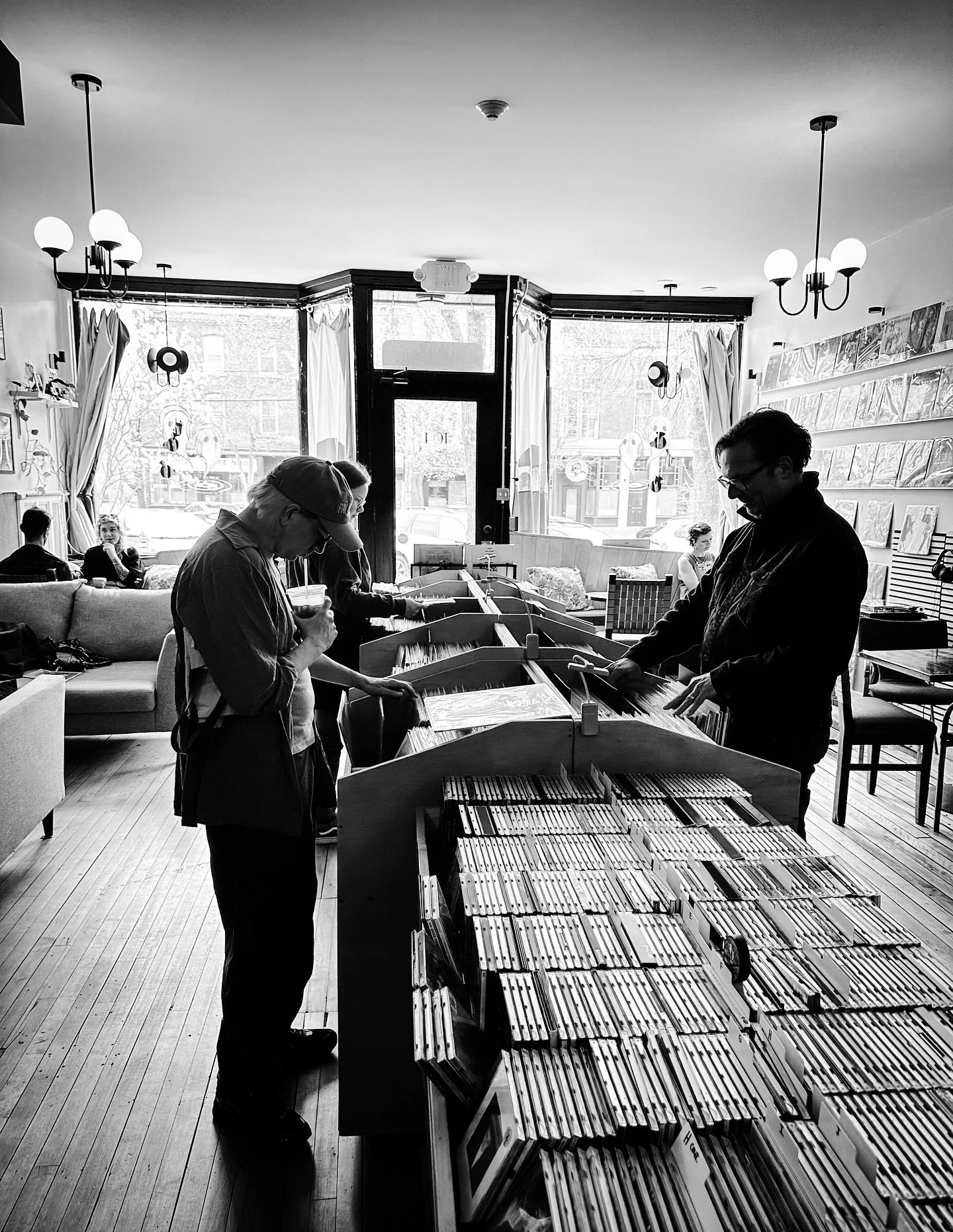 Cool new record store @twoghostsvinylcafe got classic David Bowie &amp; Miles Davis records #recordshop #cafe #cafes #vinylrecords #recordstore #blackandwhitephotography #blackandwhite #records #retro #vintage