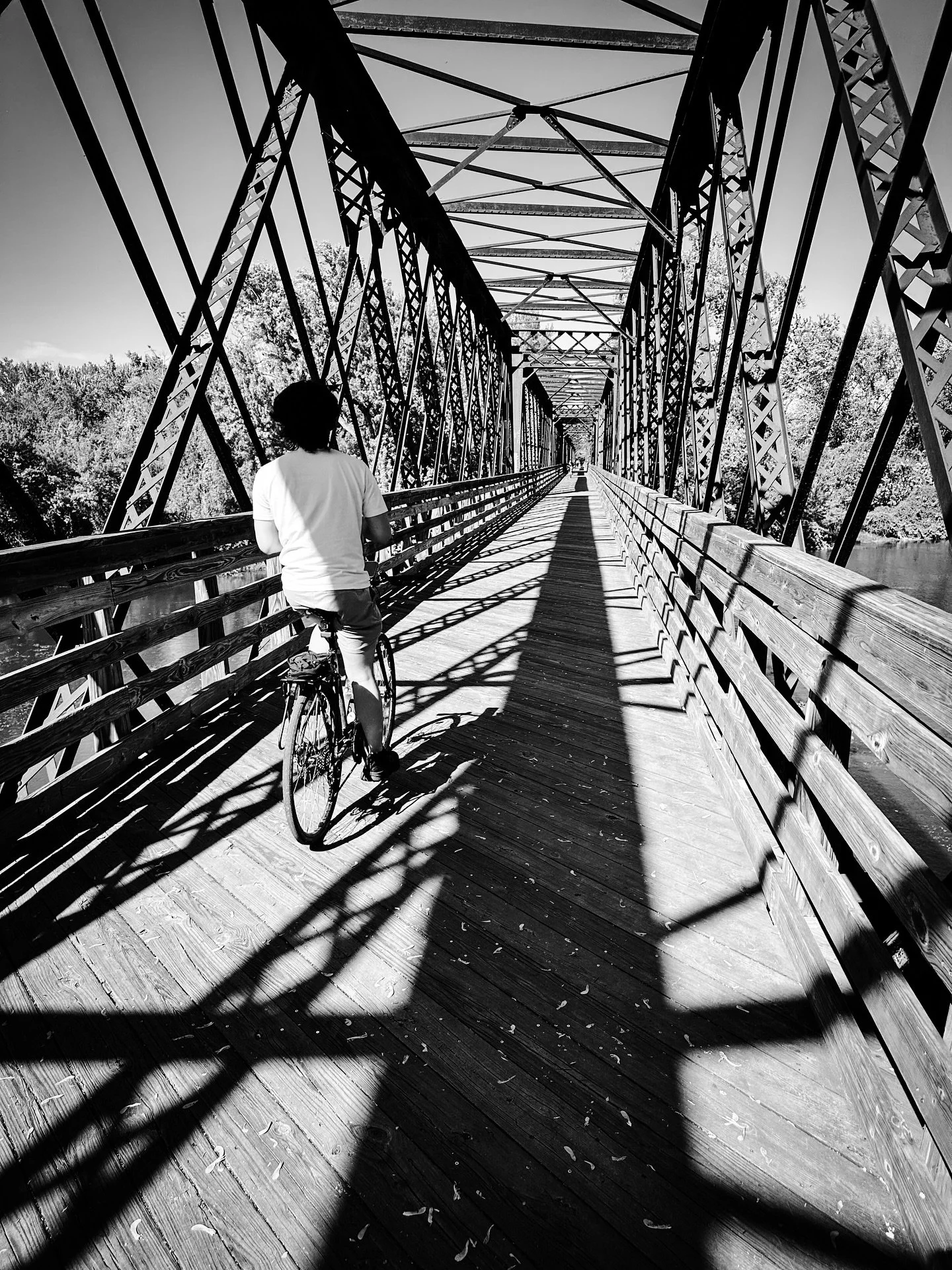 Sunny day #bike #biking #bikebridge #walk #streetphotography #streetphotos #blackandwhite #blackandwhitephotography #architecture #shadows #walking