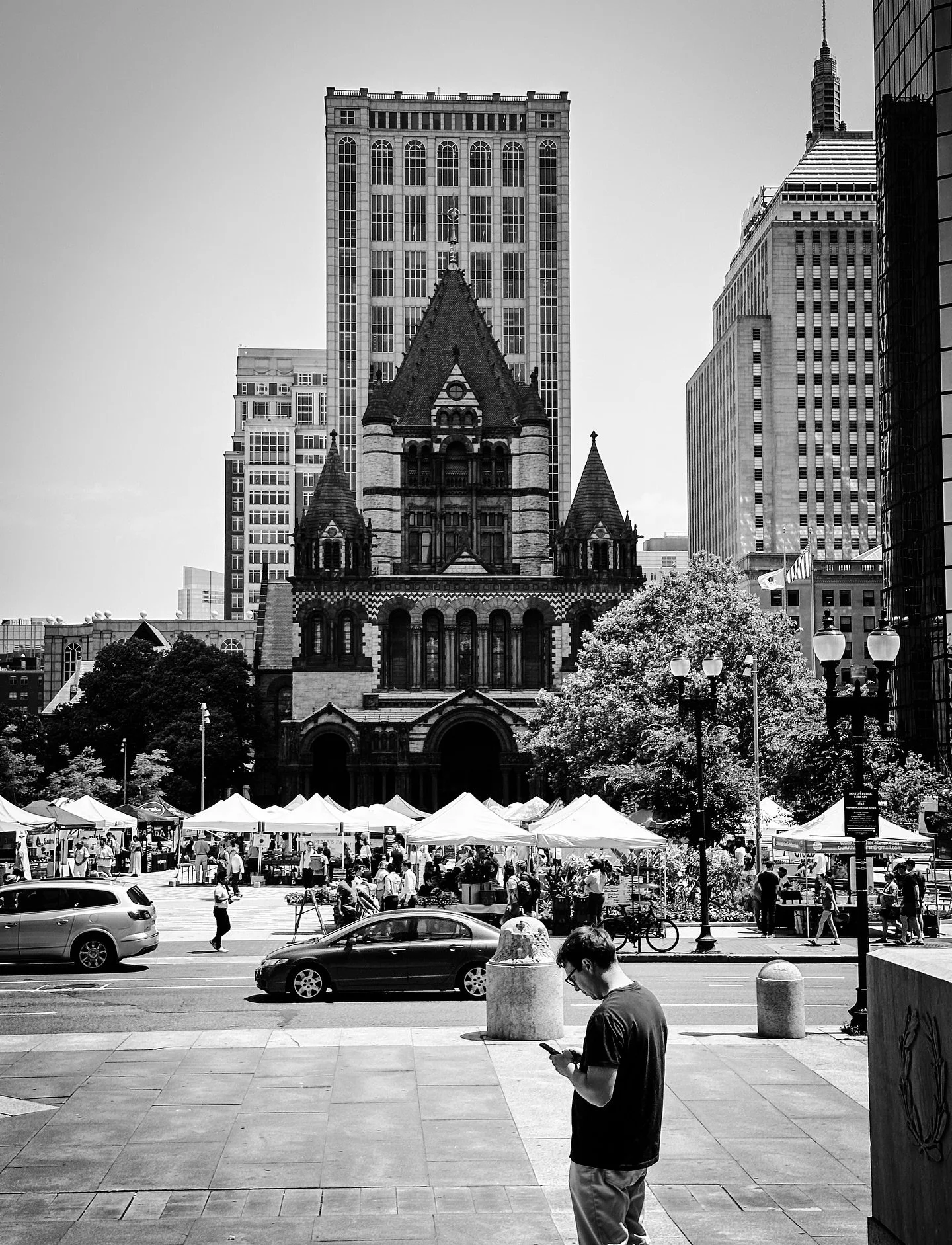 Trinity Church- farmers market, Boston #boston #streetphotography #streetphotos #blackandwhite #blackandwhitephotography #summer #farmersmarket #city #architecture