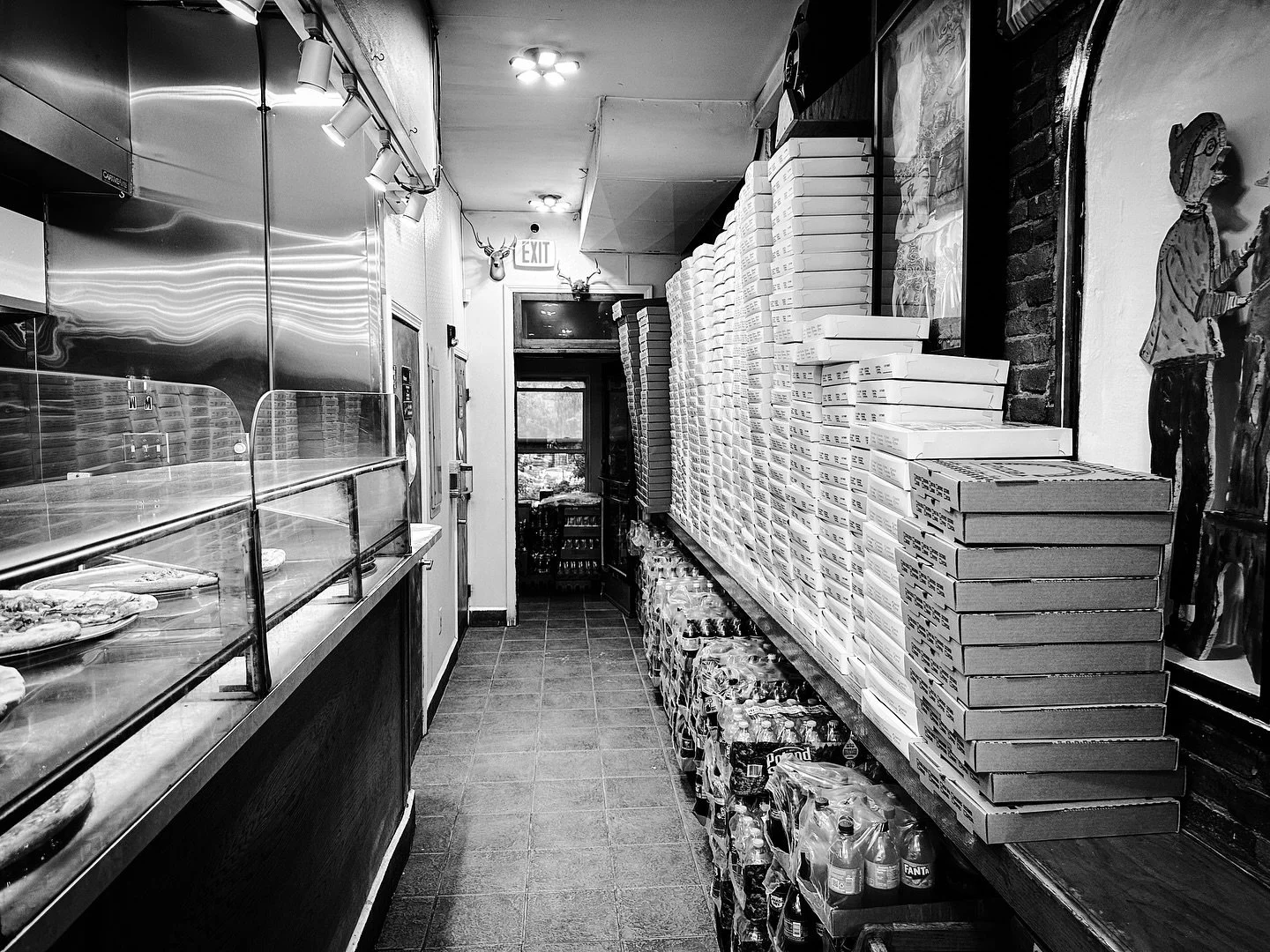 Local pizza joint #pizza #pizzajoint #blackandwhite #blackandwhitephotography #restaurant @pinnochiopizza