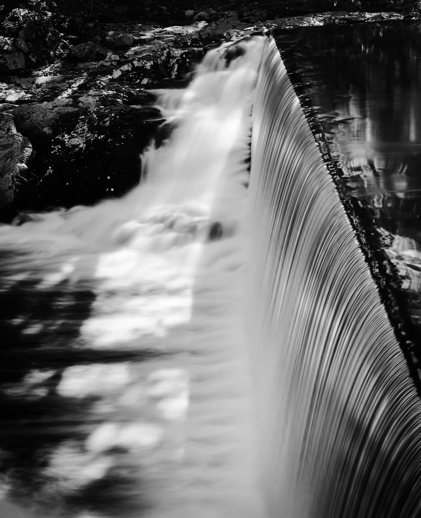Waterfall sunbeam #waterfall #sunshine #sunrays #blackandwhite #blackandwhitephotography #river #longexposure #slowexposure
