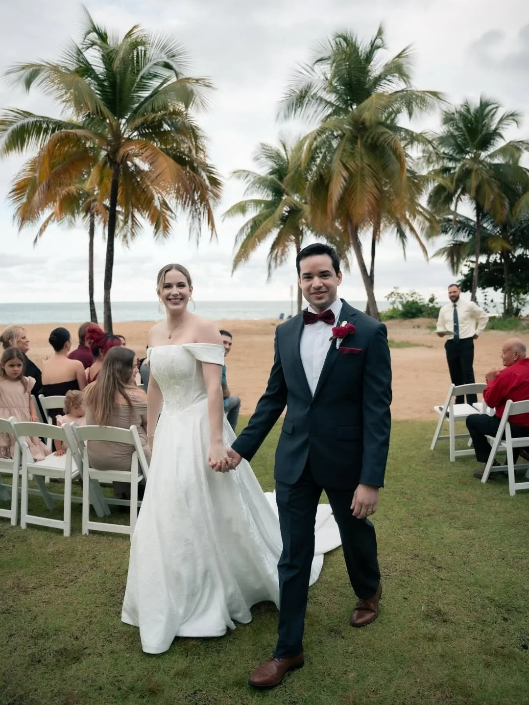 Mr. &amp; Mrs. Sepulveda ❤️ 11.16.25
Heather&rsquo;s look was pure coastal elegance: an off-the-shoulder Bridal Gown Studio silhouette with a fitted bodice, graceful neckline, and full skirt that moved beautifully against the Isla Verde breeze.
📸 @f