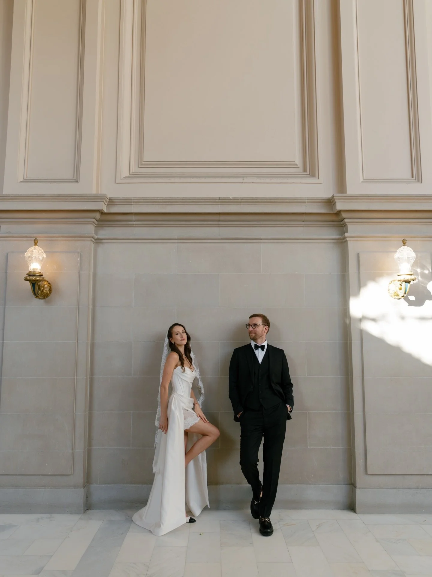 Our bride Olga redefined City Hall style in a mini gown with a statement train&mdash;tailored, modern, and undeniably chic. Proof that elopements can be just as fashion-forward as they are meaningful.

Photo by&nbsp;@lerastovik_photo
Makeup by&nbsp;@