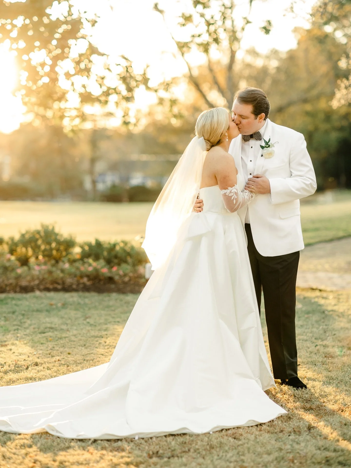 Margo&rsquo;s gown is the kind of classic that never dates. The clean strapless neckline, that beautifully tailored bodice, and the fullness of the skirt with the most elegant train made such a statement for her November wedding at The Williamsburg I