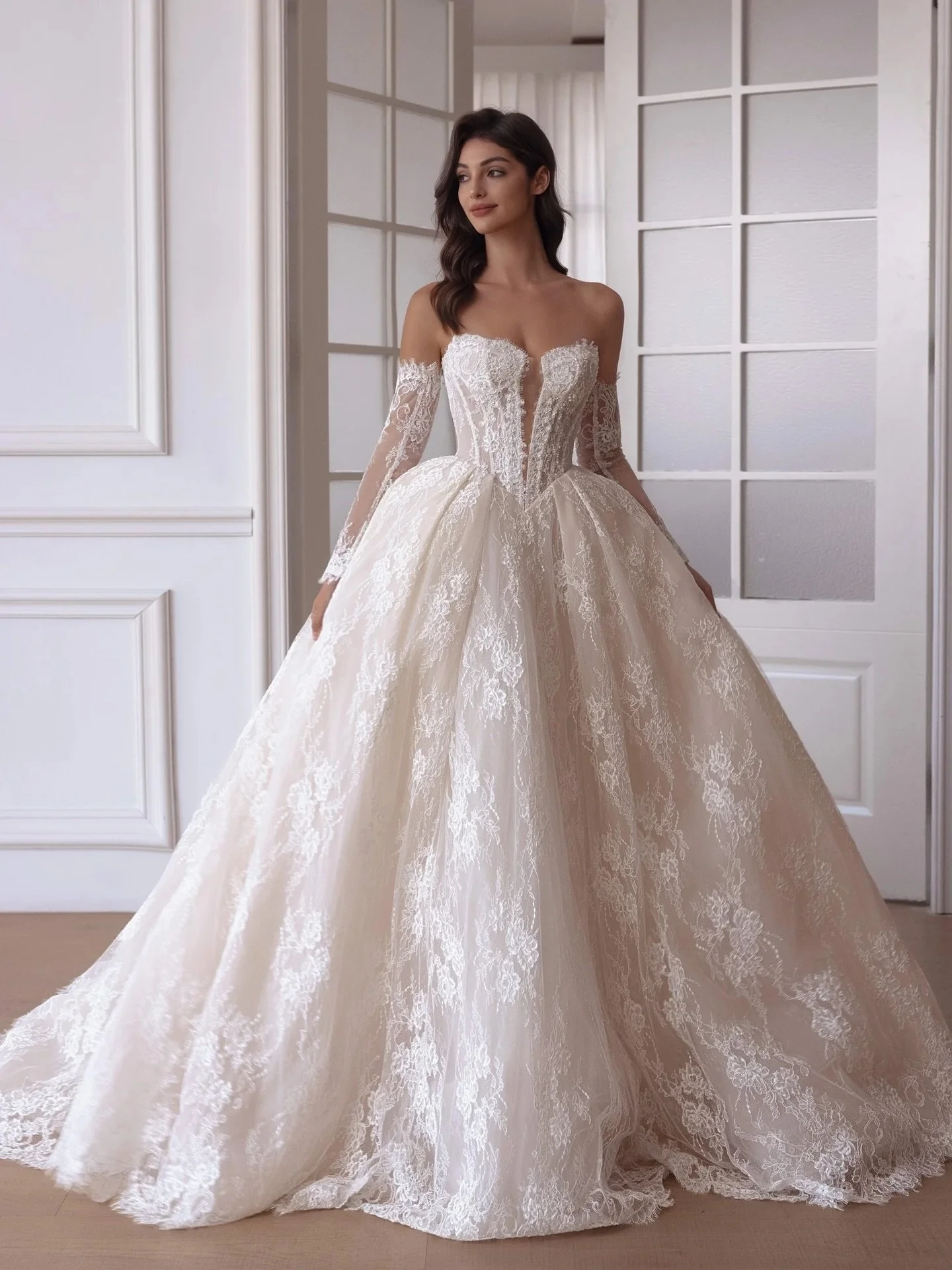 We love a gown that does everything at once.

Romantic corded lace.
Hand beading through the bodice.
A deep sweetheart neckline.
And a full ballgown silhouette that feels effortlessly regal.

It&rsquo;s the perfect mix of classic bridal and statement